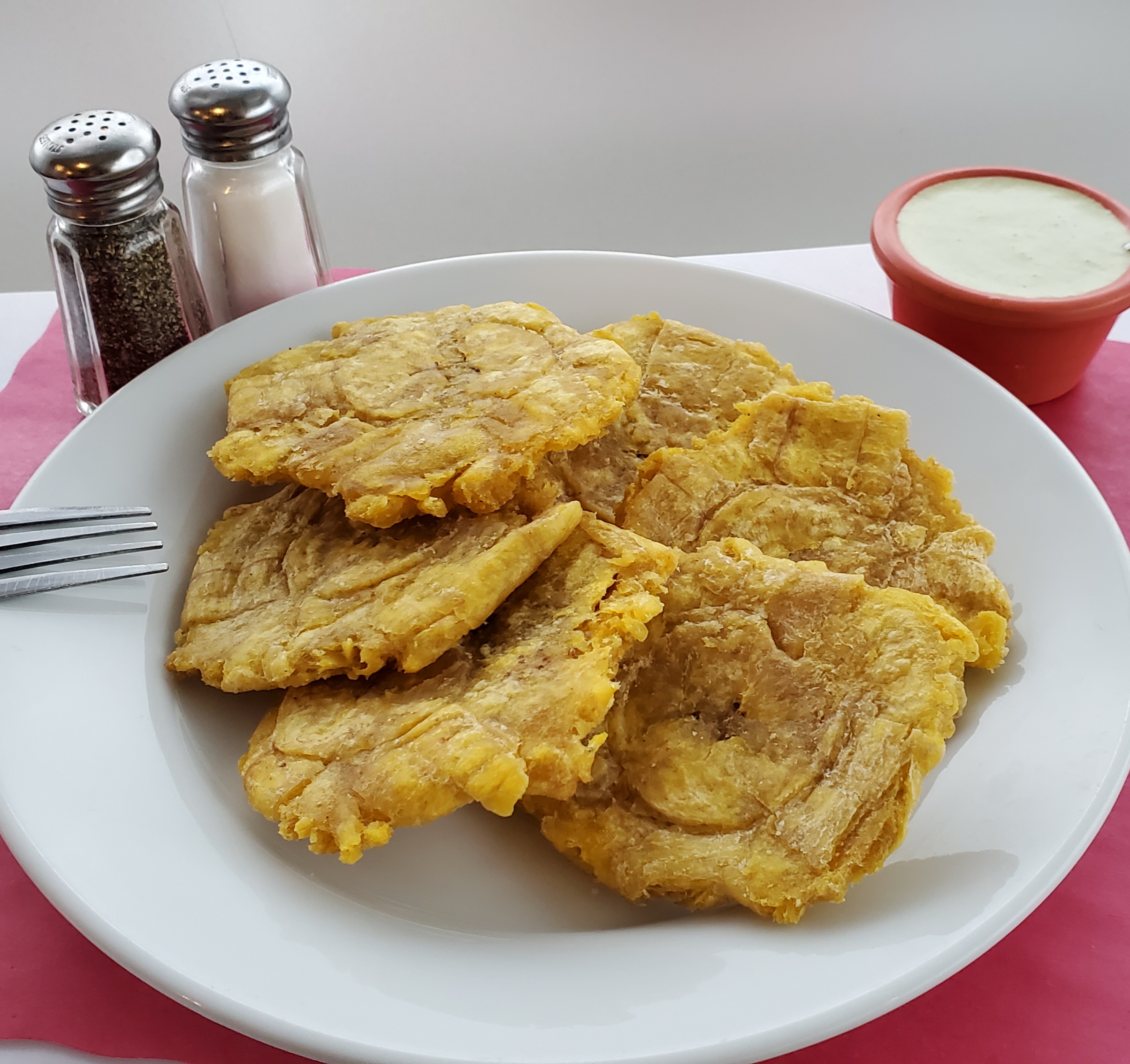 Order Tostones (Fried Plantains) food online from Mochica Restaurant store, Norwalk on bringmethat.com