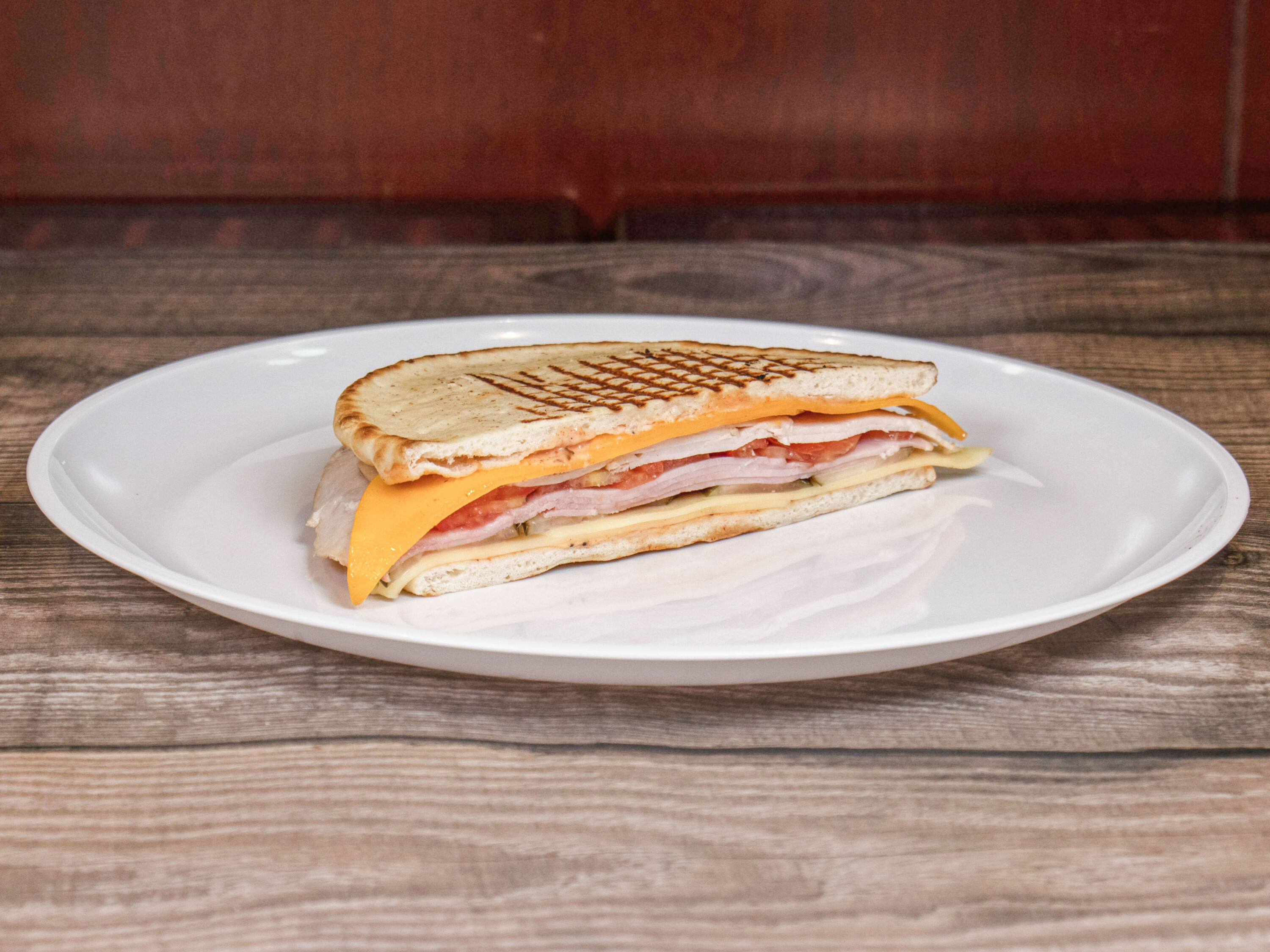 Order Smoked Turkey and Ham Panini food online from Devon and Blakely store, Washington on bringmethat.com
