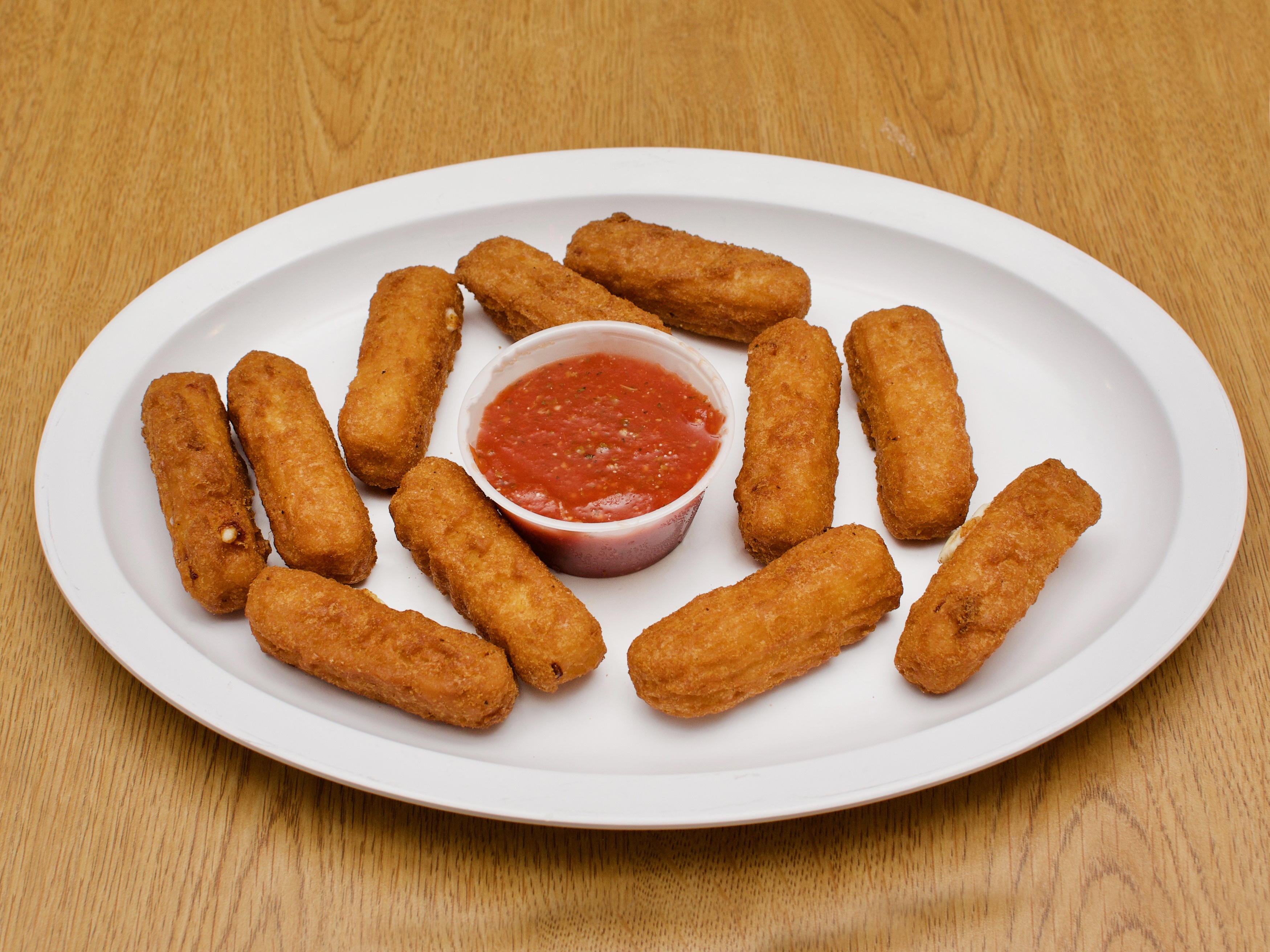 Order Mozzarella Sticks food online from Fairlington Pizza Carry Out store, Alexandria on bringmethat.com
