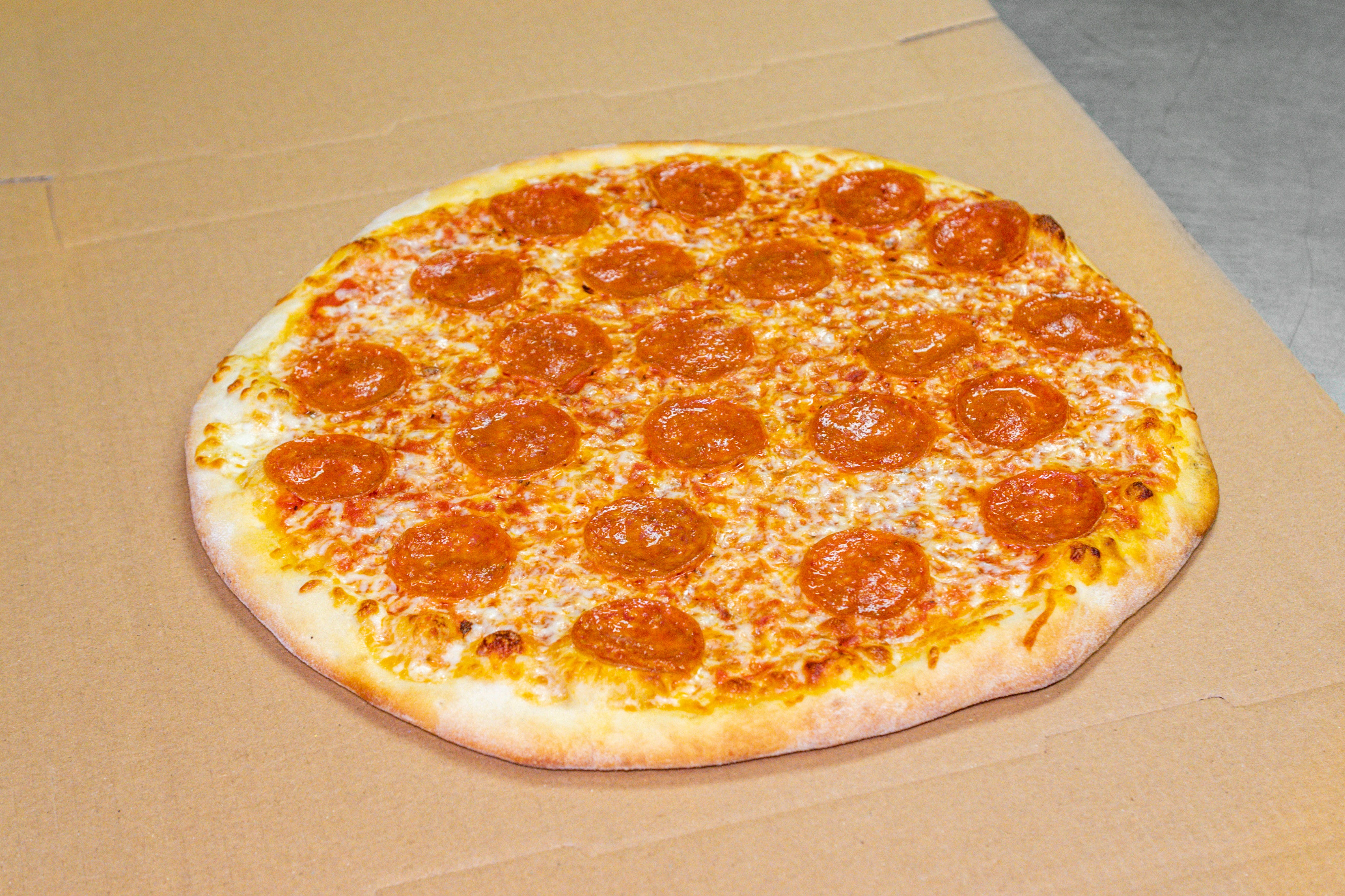 Order One Topping Pizza - Large 14'' food online from Venice Pizzeria store, Santa Clarita on bringmethat.com
