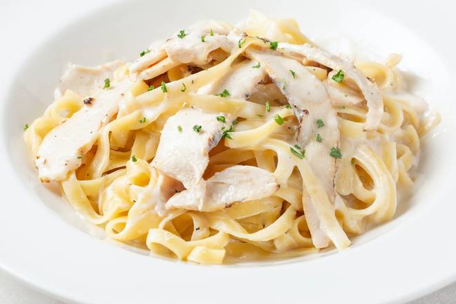 Order CLASSIC FETTUCCINE ALFREDO food online from Johnny Carino's store, Sioux Falls on bringmethat.com