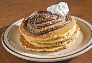 Order Nutella Hazelnut Pancakes food online from Sunnyside Cafe & Restaurant store, Virginia Beach on bringmethat.com