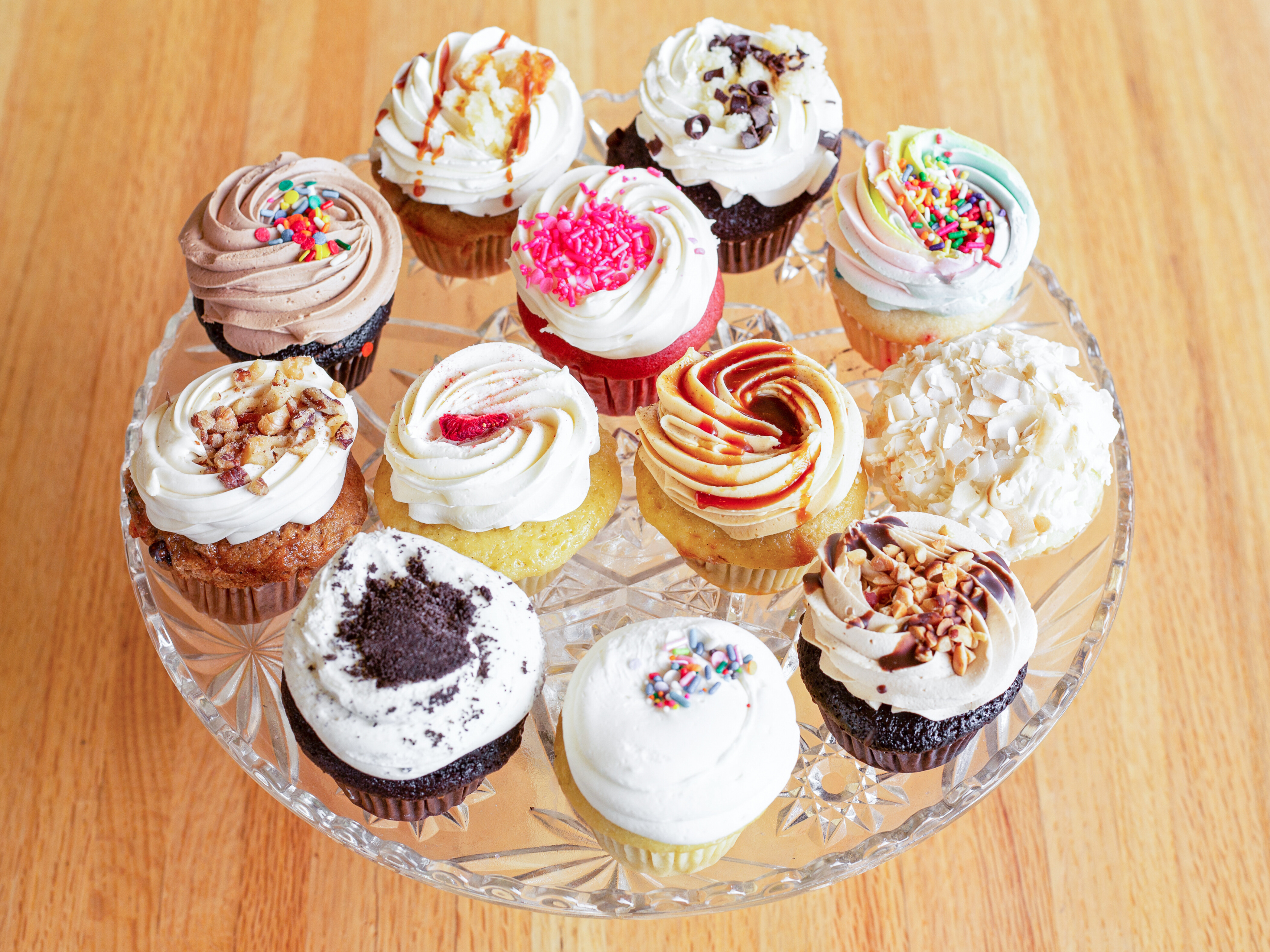 Order CUPCAKES - Assorted Dozen food online from Courageous Bakery & Cafe store, Oak Park on bringmethat.com