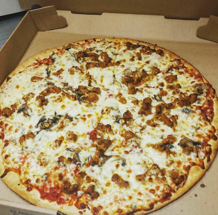 Order Deluxe Pizza food online from Halal Vocelli Pizza store, Falls Church on bringmethat.com