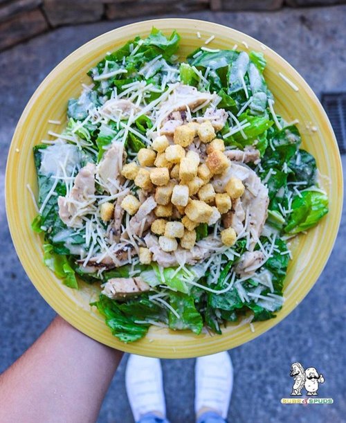 Order Caesar Salad with Chicken food online from Subs & Spuds store, Riverside on bringmethat.com