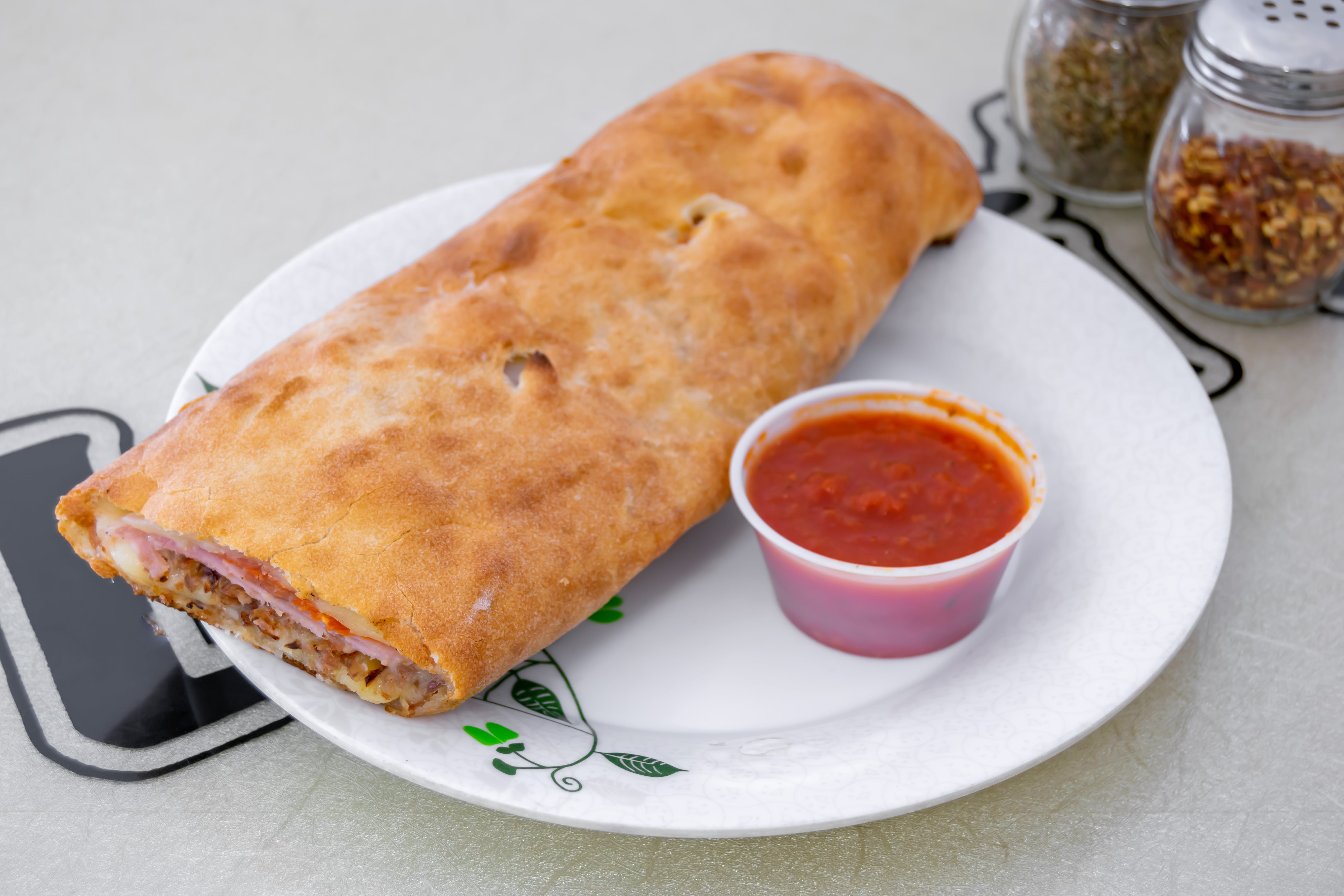 Order Meat Stromboli - Small food online from Luigi New York Style Pizza store, South Plainfield on bringmethat.com