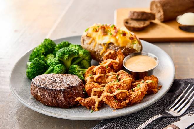 Order NEW! Sirloin* & Bloomin' Fried Shrimp food online from Outback Steakhouse store, St. Peters on bringmethat.com