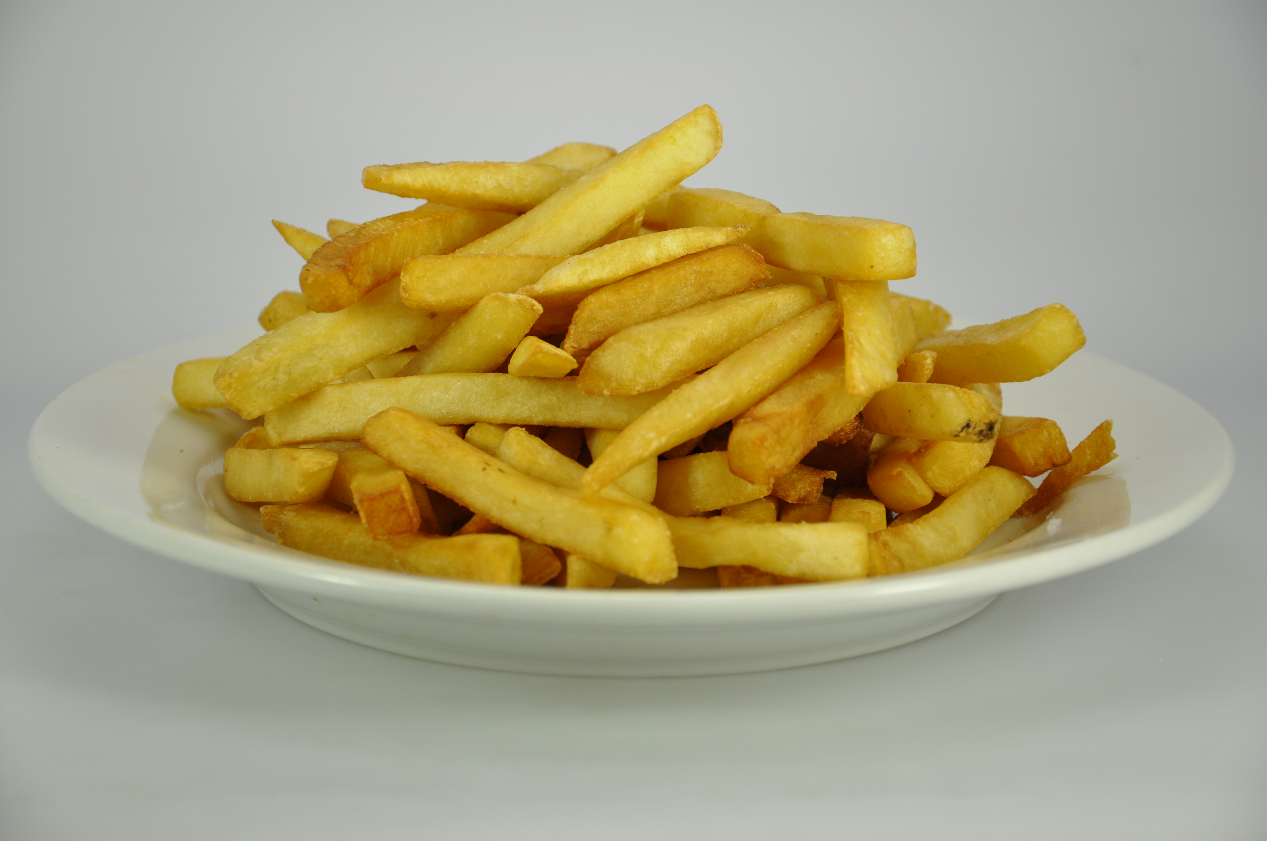 Order French Fries food online from Kaieteur Express Restaurant store, South Richmond Hill on bringmethat.com