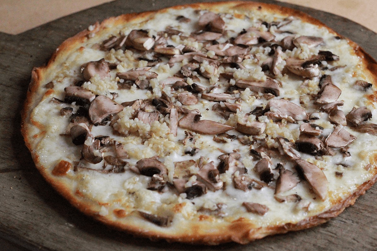 Order White Mushroom Pizza food online from Pizzarev River Walk store, Bakersfield on bringmethat.com