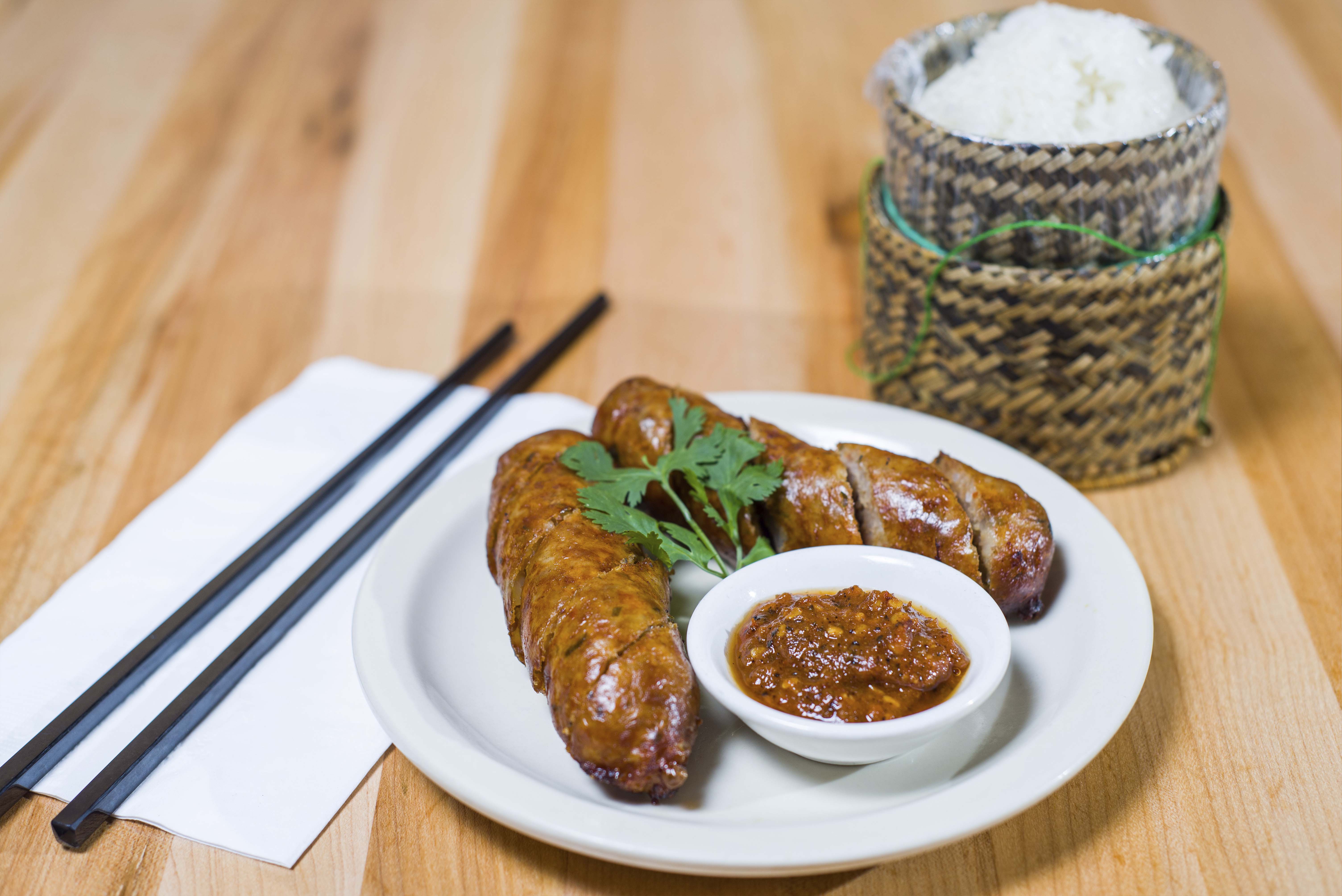 Order E6 Lao Pork Sausages food online from Flavor Lao Bowl store, Seattle on bringmethat.com