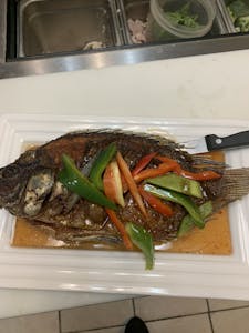 Order 17. Fried Whole Tilapia with 3 Flavors Sauce food online from Bangkok Thai Cuisine store, Dover on bringmethat.com