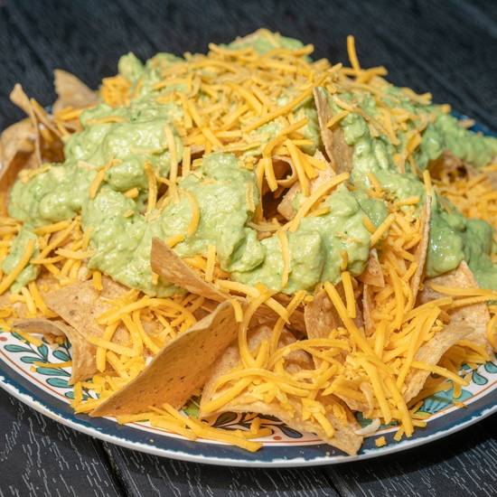 Order Chips w/ Guac & Cheese food online from El Pollo Grill store, Chula Vista on bringmethat.com