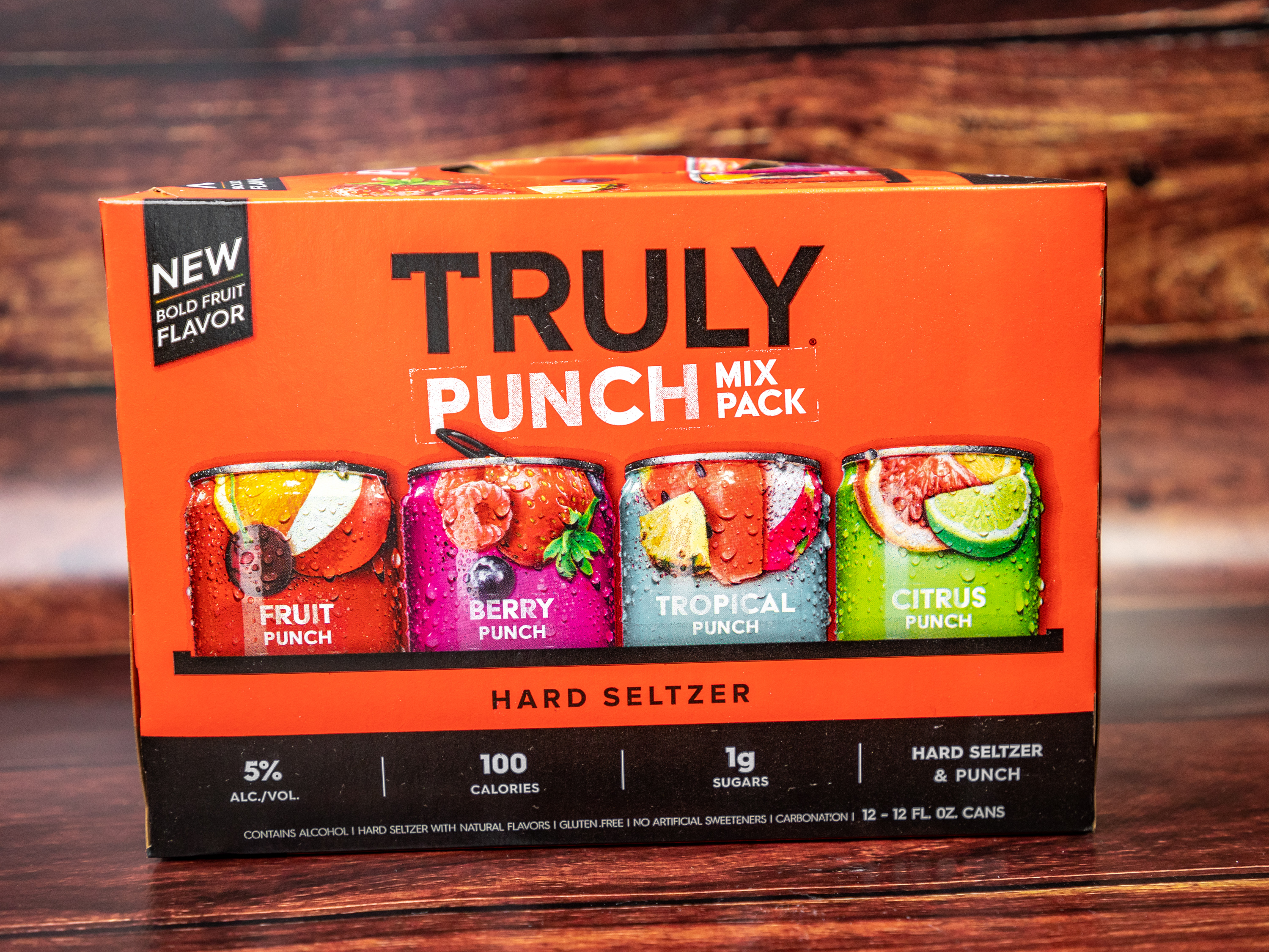 Order TRULY HARD SELTZER PUNCH VERIETY 12PACK 12OZ CAN food online from Chantry Wine And Liquor store, Riverside on bringmethat.com
