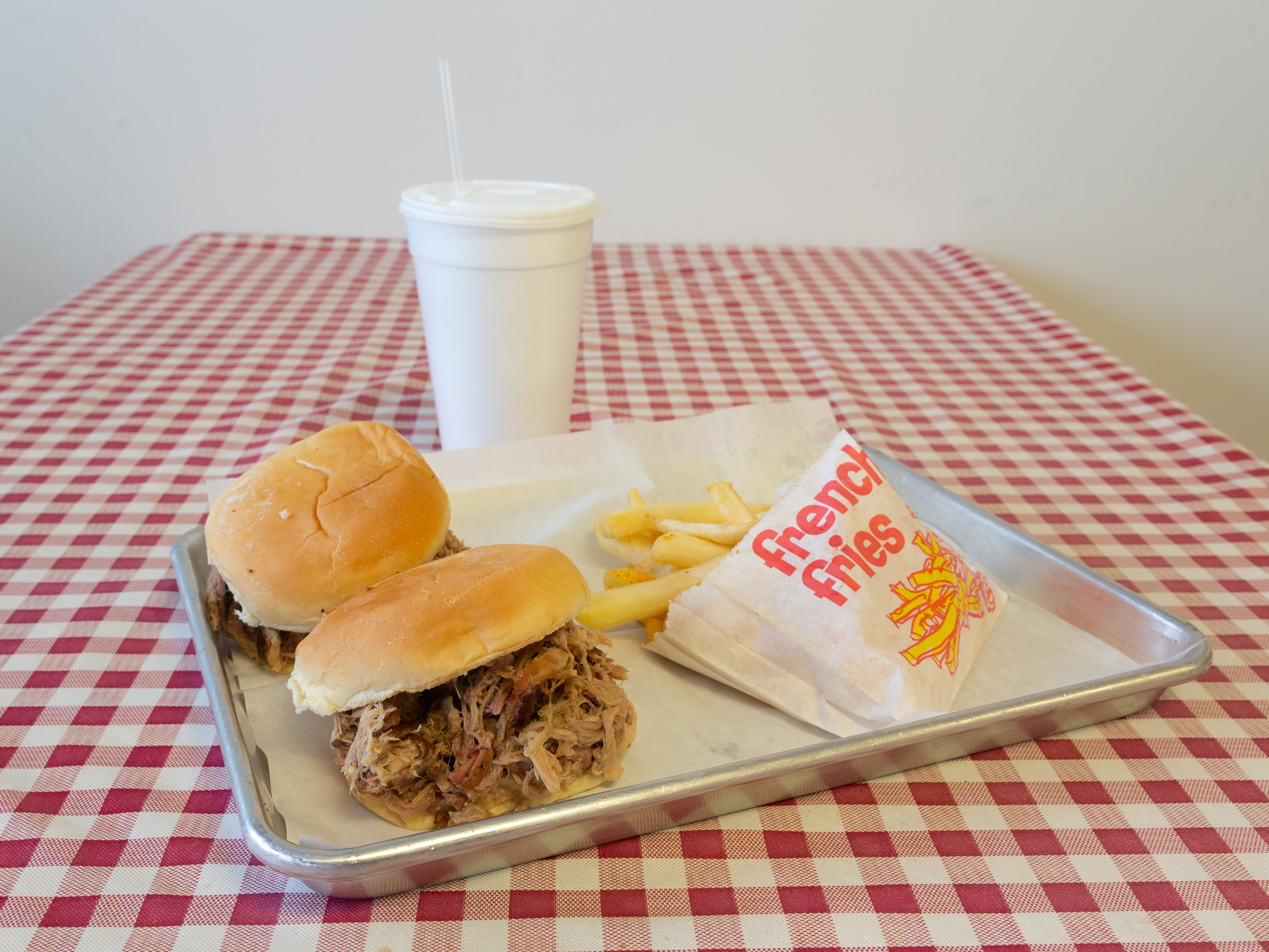 Order Pulled Pork Sandwich Combo food online from Reggie's BBQ store, Clarksville on bringmethat.com