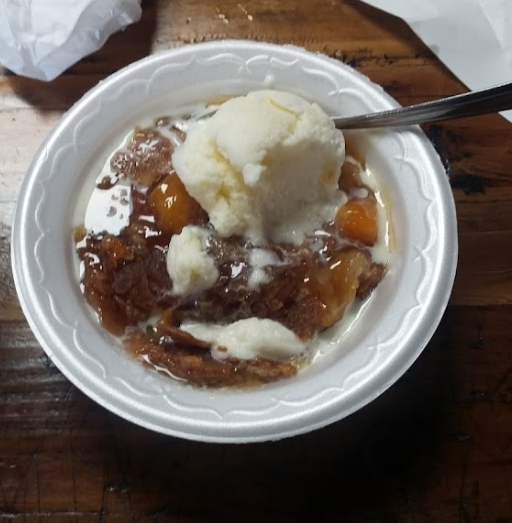 Order Peach Cobbler and Homemade Vanilla Ice Cream food online from Packsaddle BBQ store, San Angelo on bringmethat.com