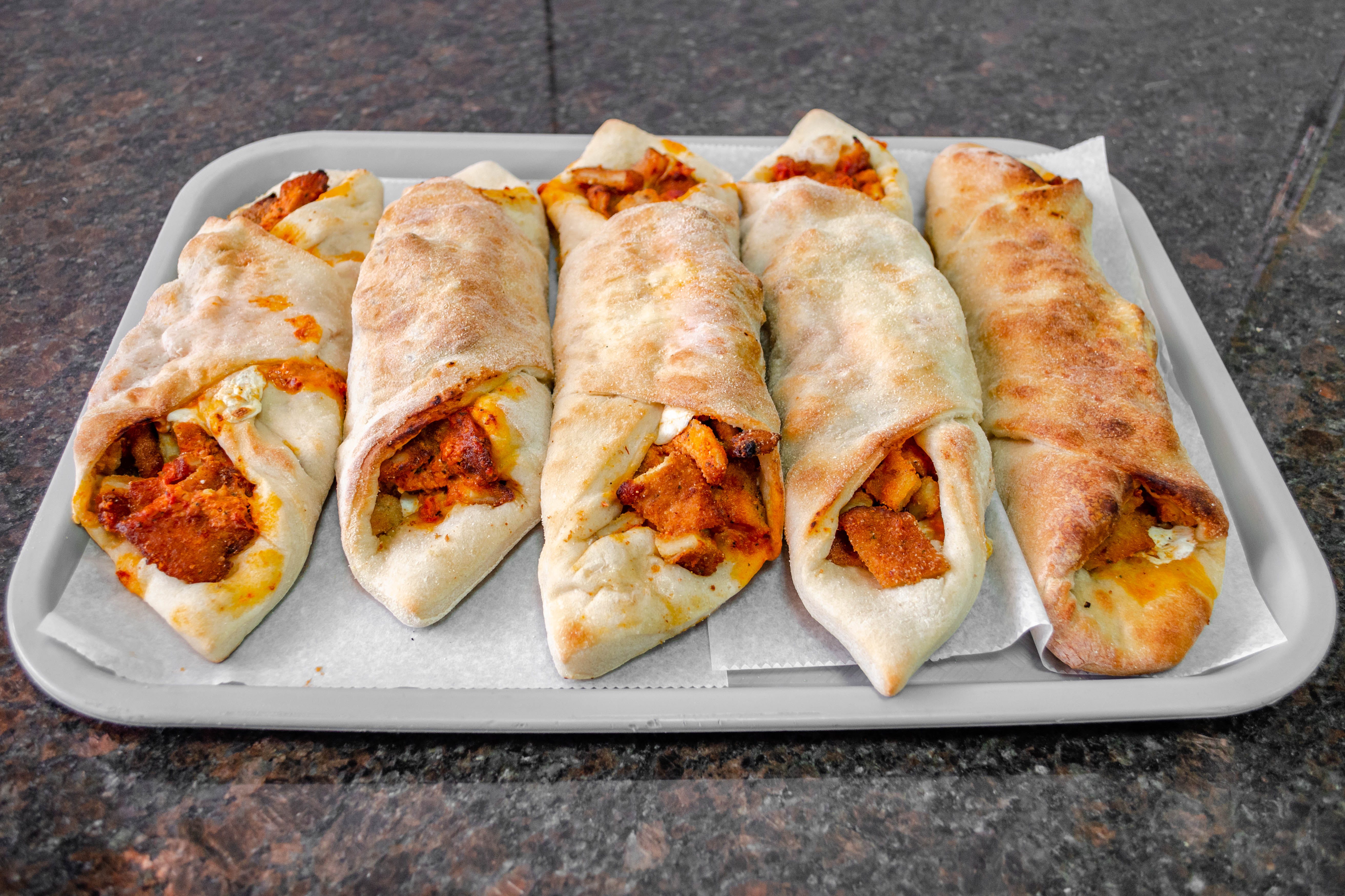 Order Chicken Rolls - Roll food online from Justino's Pizza store, New York on bringmethat.com