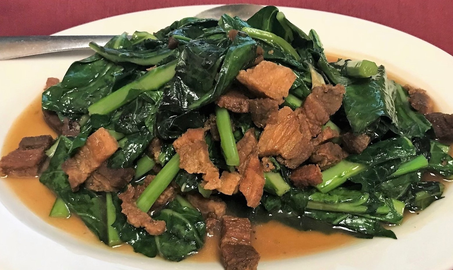 Order Kana Crispy Pork food online from Sweet Basil Thai Cuisine store, Hurst on bringmethat.com