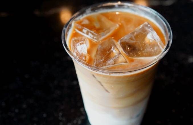 Order Latte (16oz Iced) food online from Elegy Coffee store, Nashville on bringmethat.com