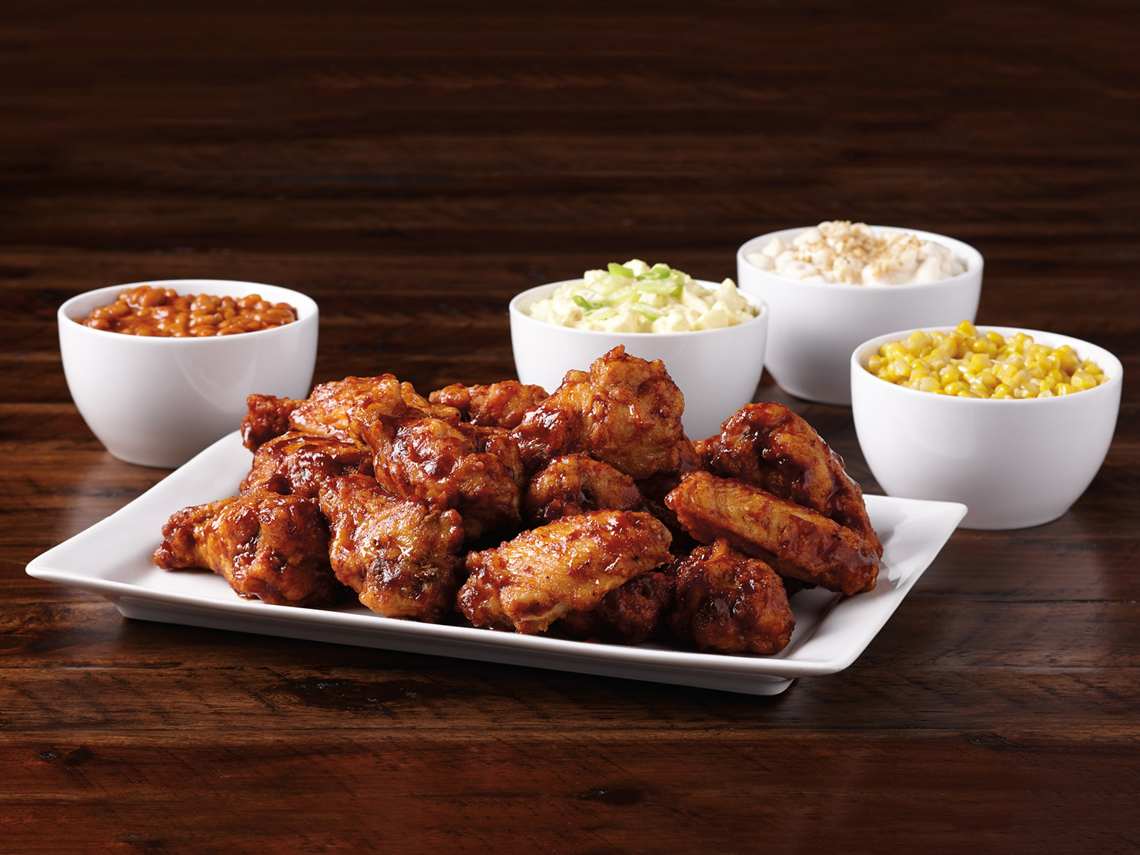 Order Wings Dinner for 4 - Served Hot food online from Hy-Vee Mealtime store, Ames on bringmethat.com