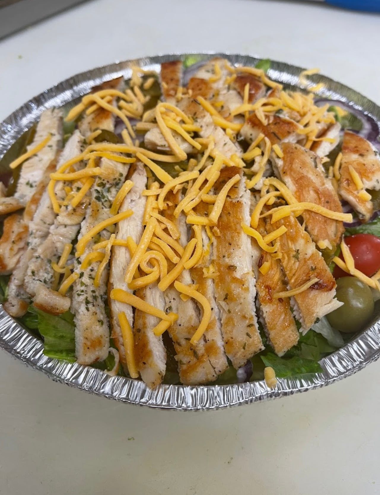 Order Grilled Chicken Salad - Medium food online from Anthony's Pizzeria store, Wind Gap on bringmethat.com
