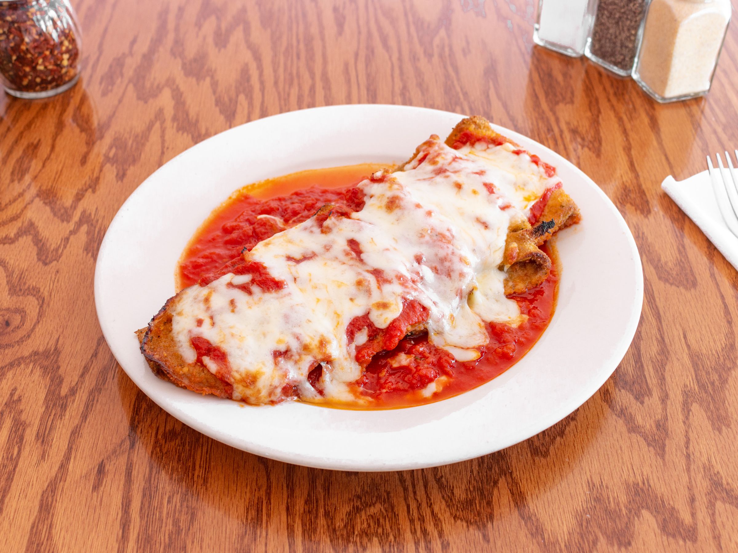 Order Eggplant Parmigiana Dinner food online from Three Boys From Italy store, Northvale on bringmethat.com