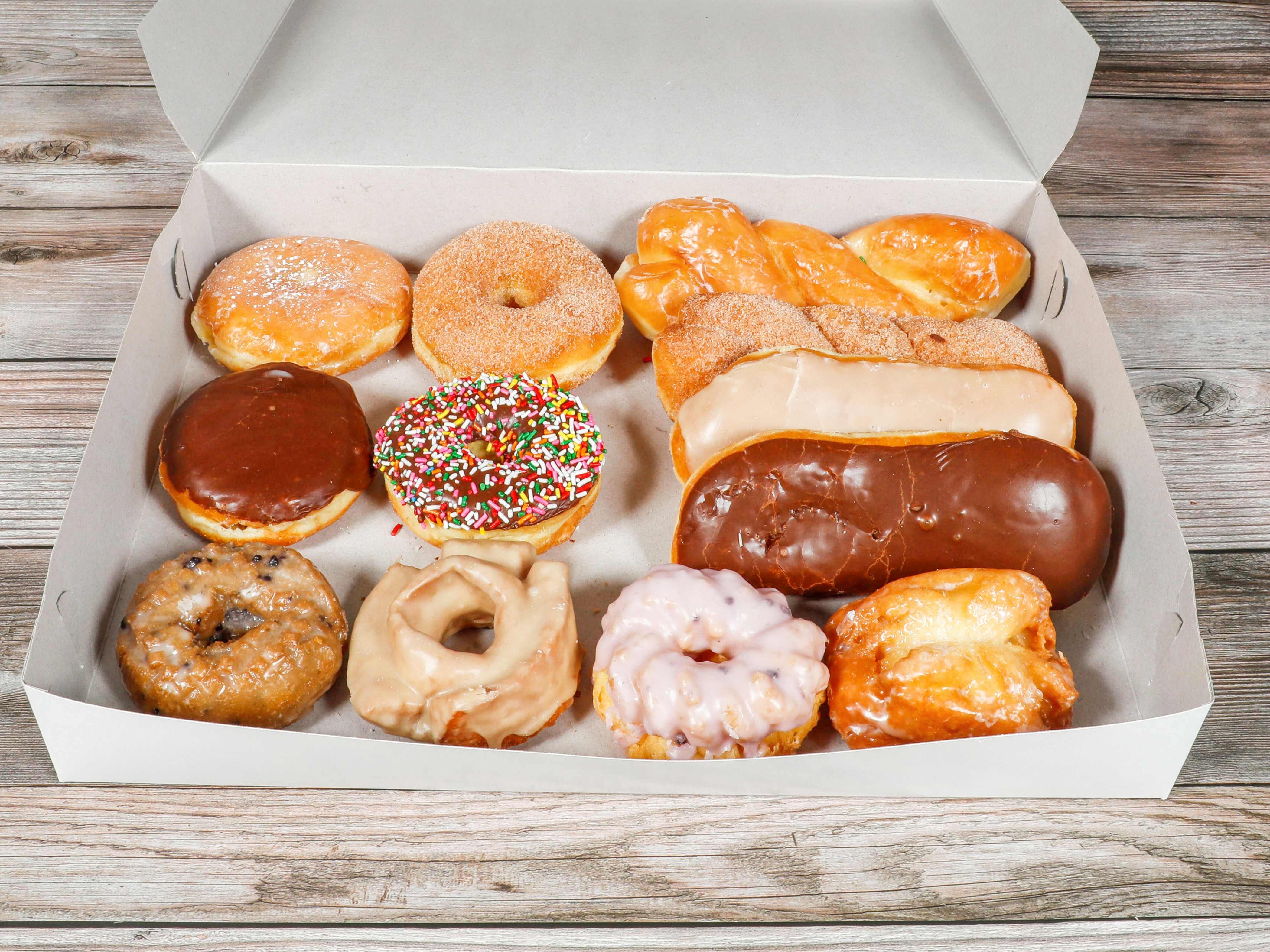 Order Mixed Dozen food online from Donuts & Coffey store, Sacramento on bringmethat.com