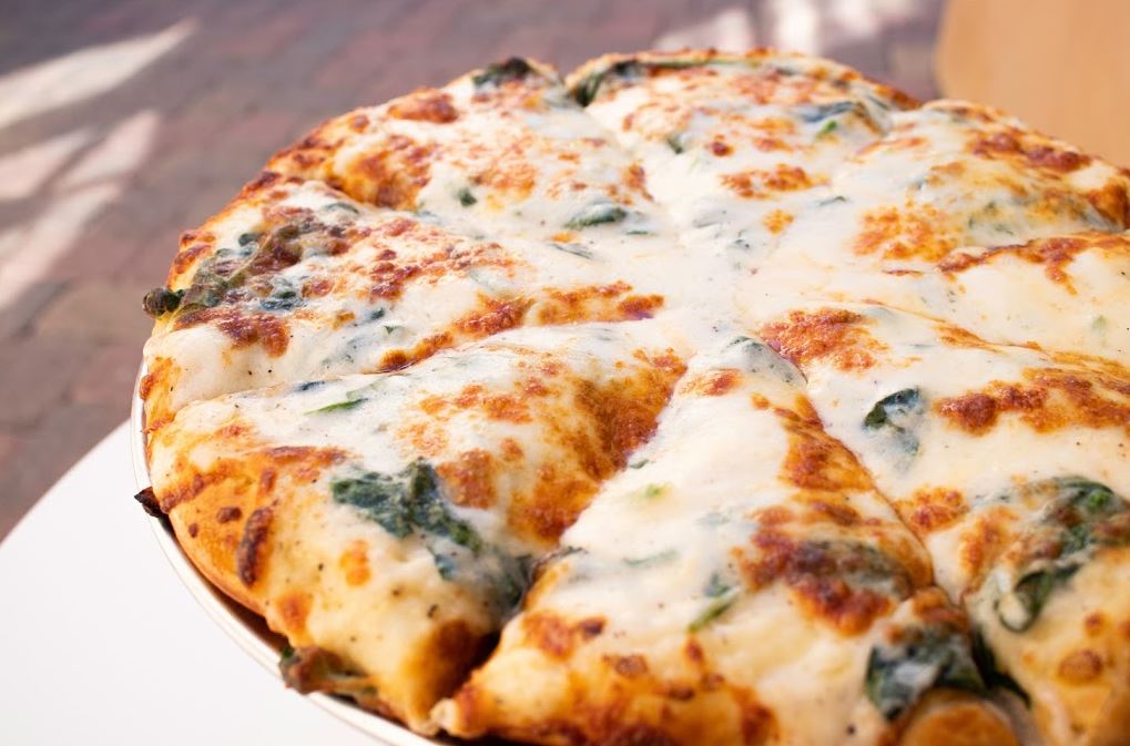Order Spinach Alfredo Specialty Pizza food online from 4 Eggs & Pizza store, Santa Barbara on bringmethat.com
