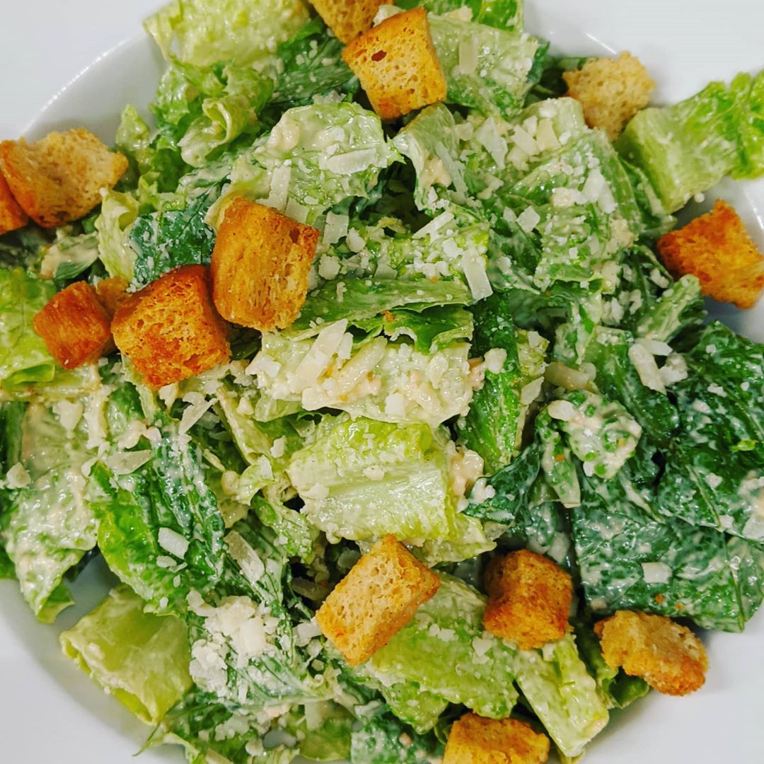 Order Classic Caesar Salad (Large) food online from 3 Brothers Pizza Cafe store, Farmingdale on bringmethat.com