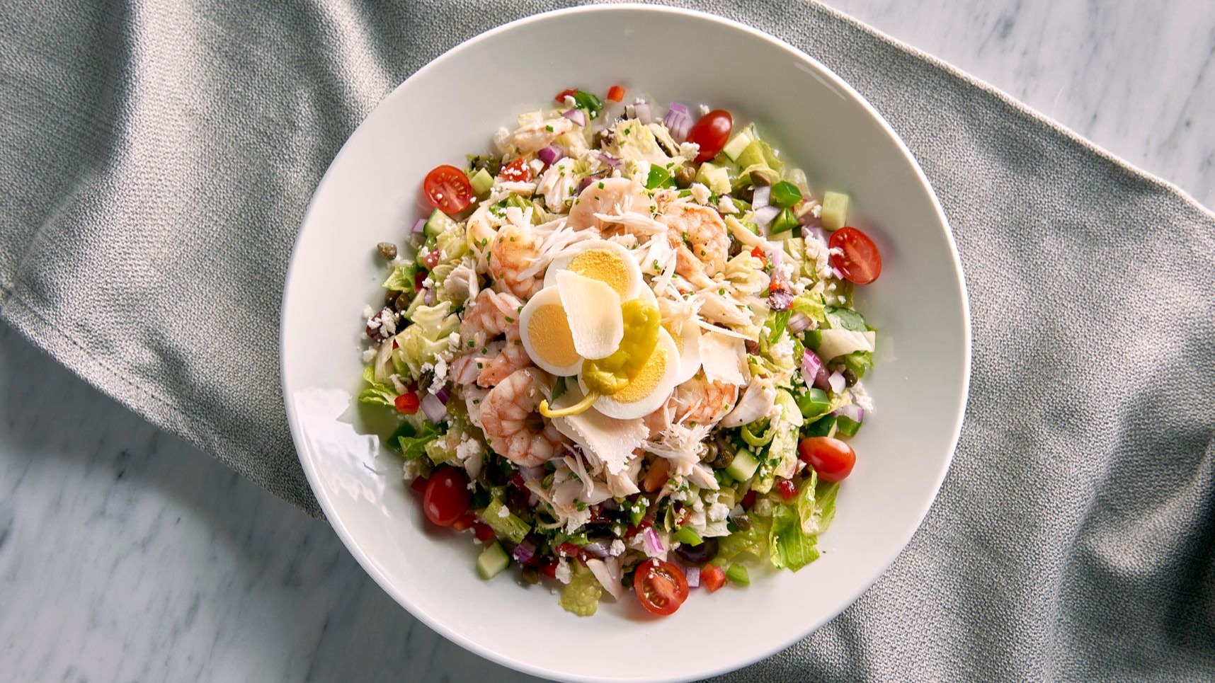 Order Seafood Chopped Salad food online from The Oceanaire Seafood Room store, Washington on bringmethat.com