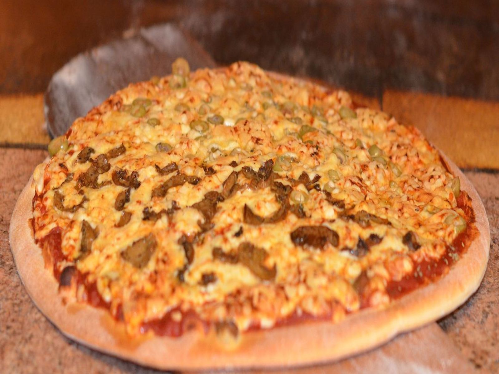 Order Large Pizza Regular dough food online from Bibi's Bakery Cafe store, Los Angeles on bringmethat.com
