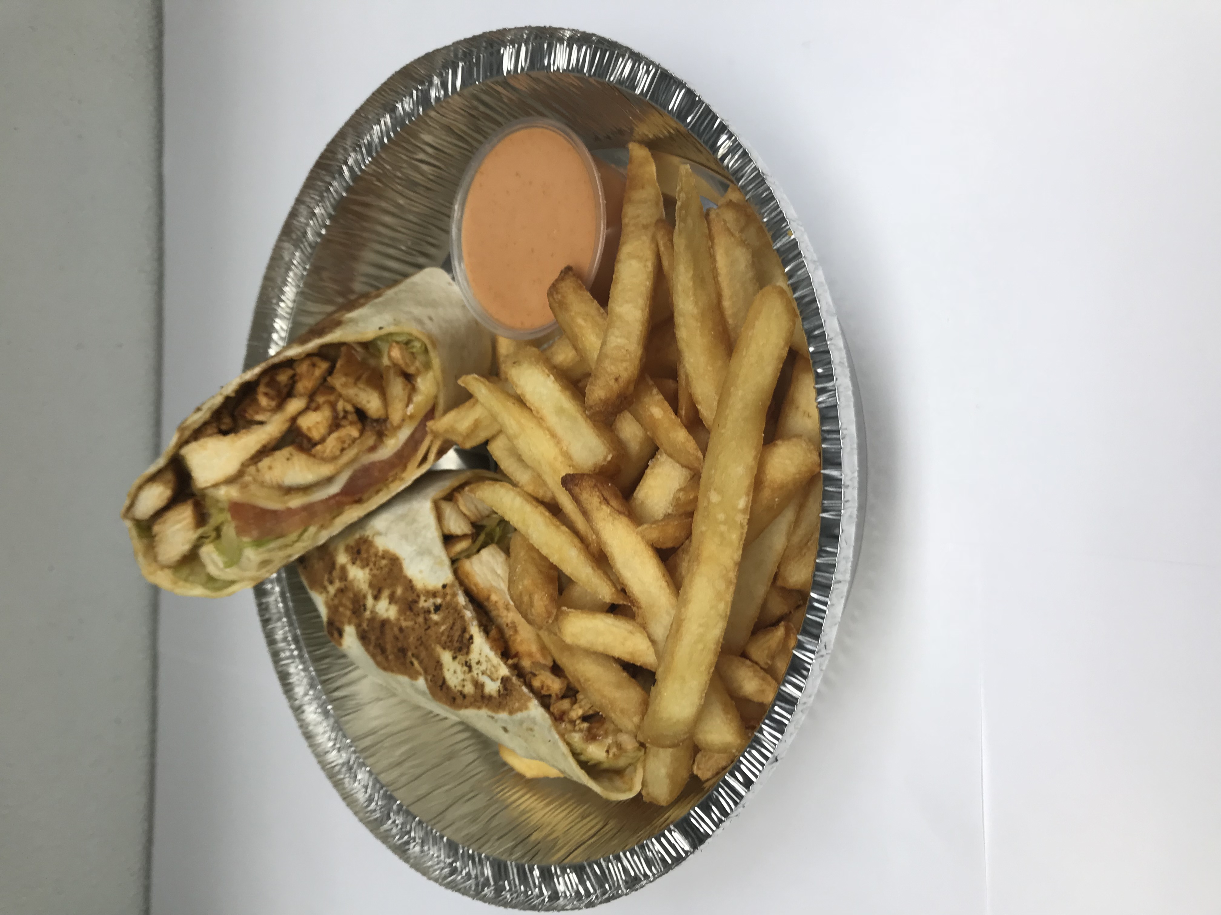 Order Salsa Chicken Wrap with Can of Soda food online from Elmhurst Deli store, Elmhurst on bringmethat.com