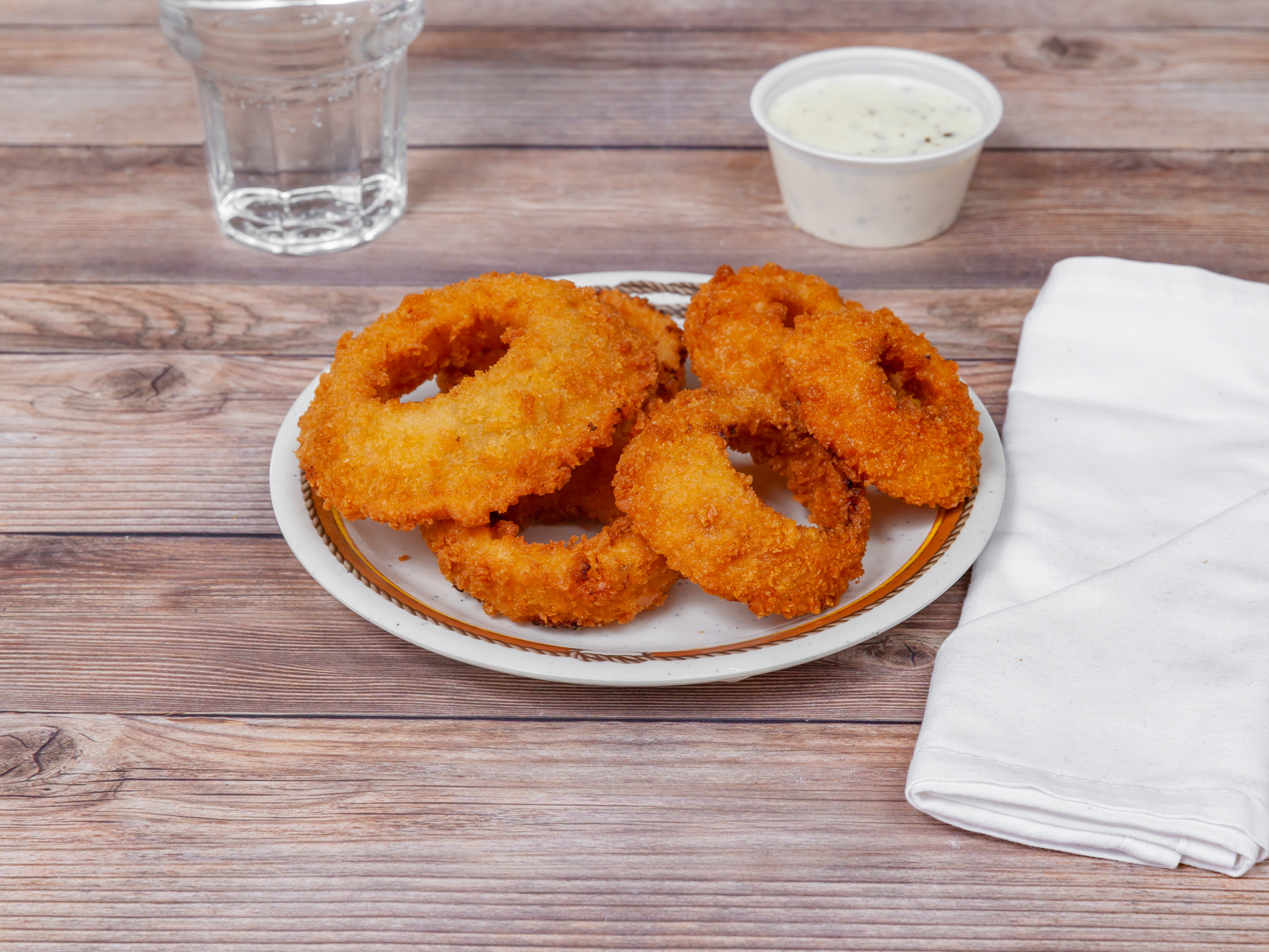 Order Onion Rings food online from Village Pizza & Pub store, Carpentersville on bringmethat.com