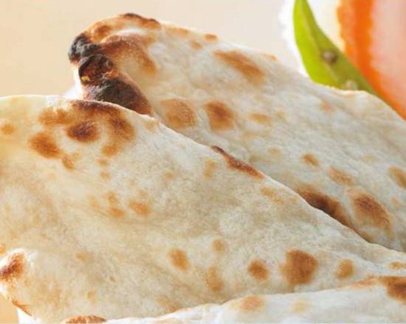 Order Butter Naan food online from Deccan House store, San Francisco on bringmethat.com