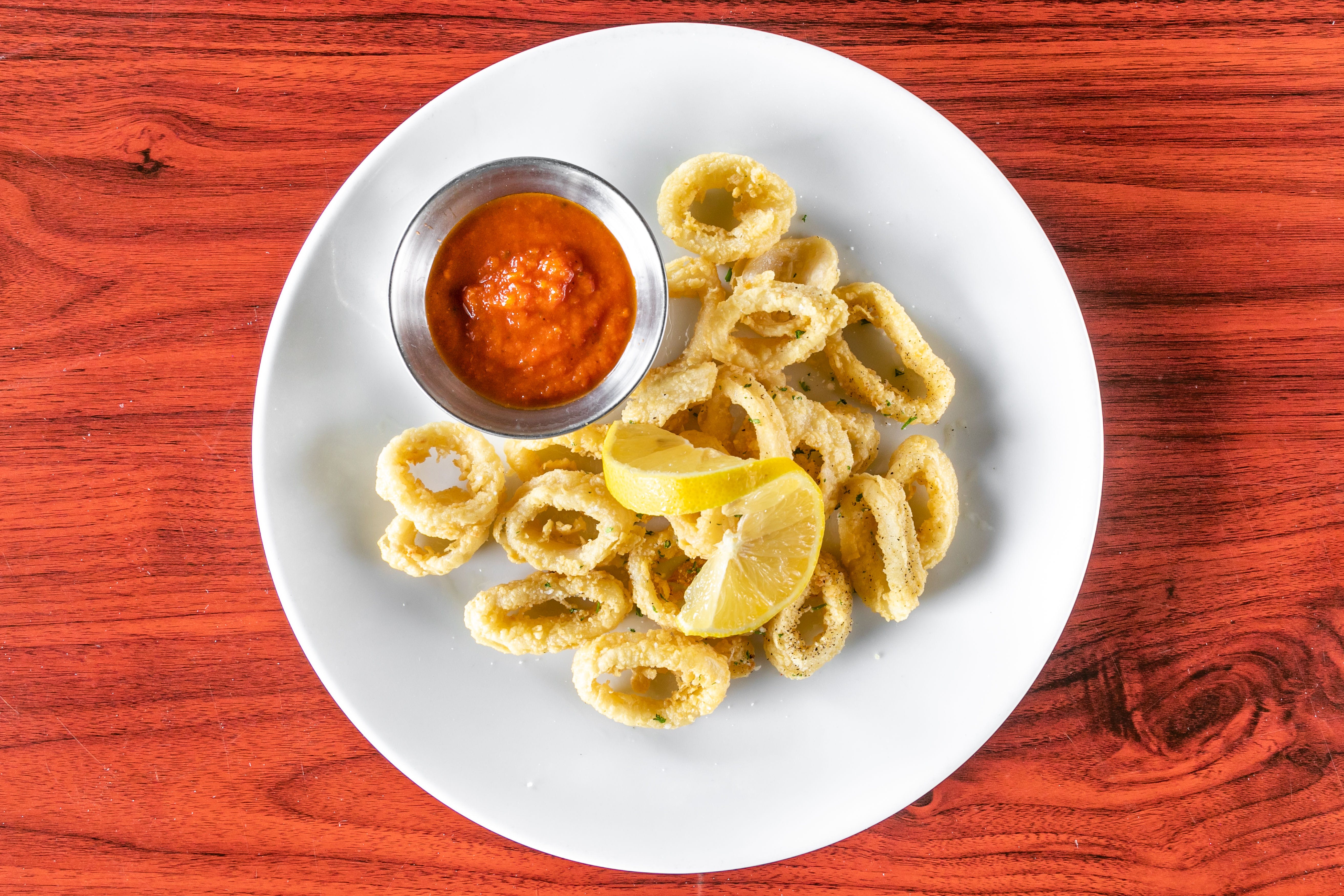 Order Fried Calamari - Appetizer food online from Bellissimo store, Colleyville on bringmethat.com