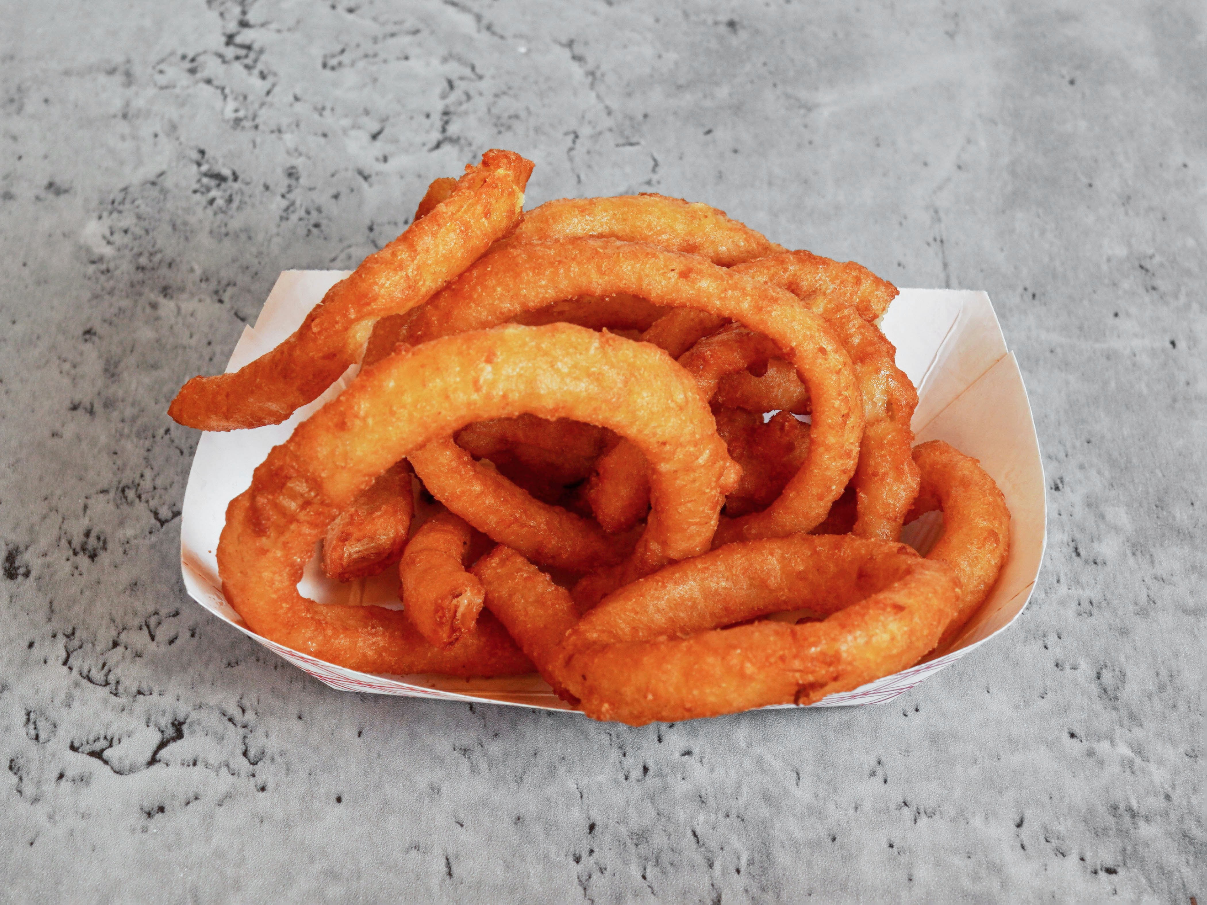 Order Hand Breaded Onion Rings food online from Old Chicago Red Hots store, Gurnee on bringmethat.com