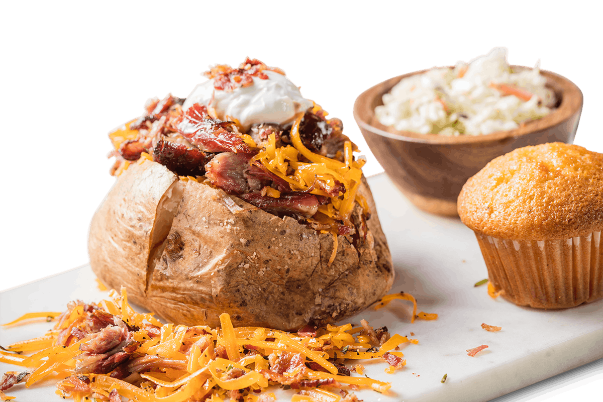 Order BBQ Stuffed Baked Potato food online from Famous Daves Bar-B-Que store, Reno on bringmethat.com