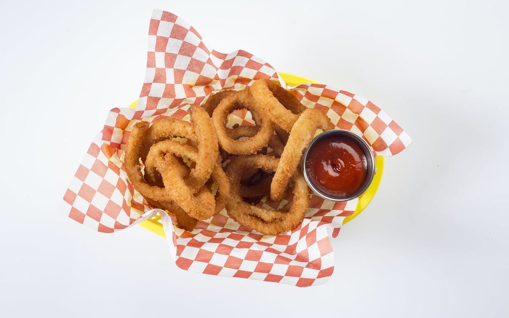 Order Onion Rings - Appetizer food online from Nonna's Pizza store, La Grange on bringmethat.com