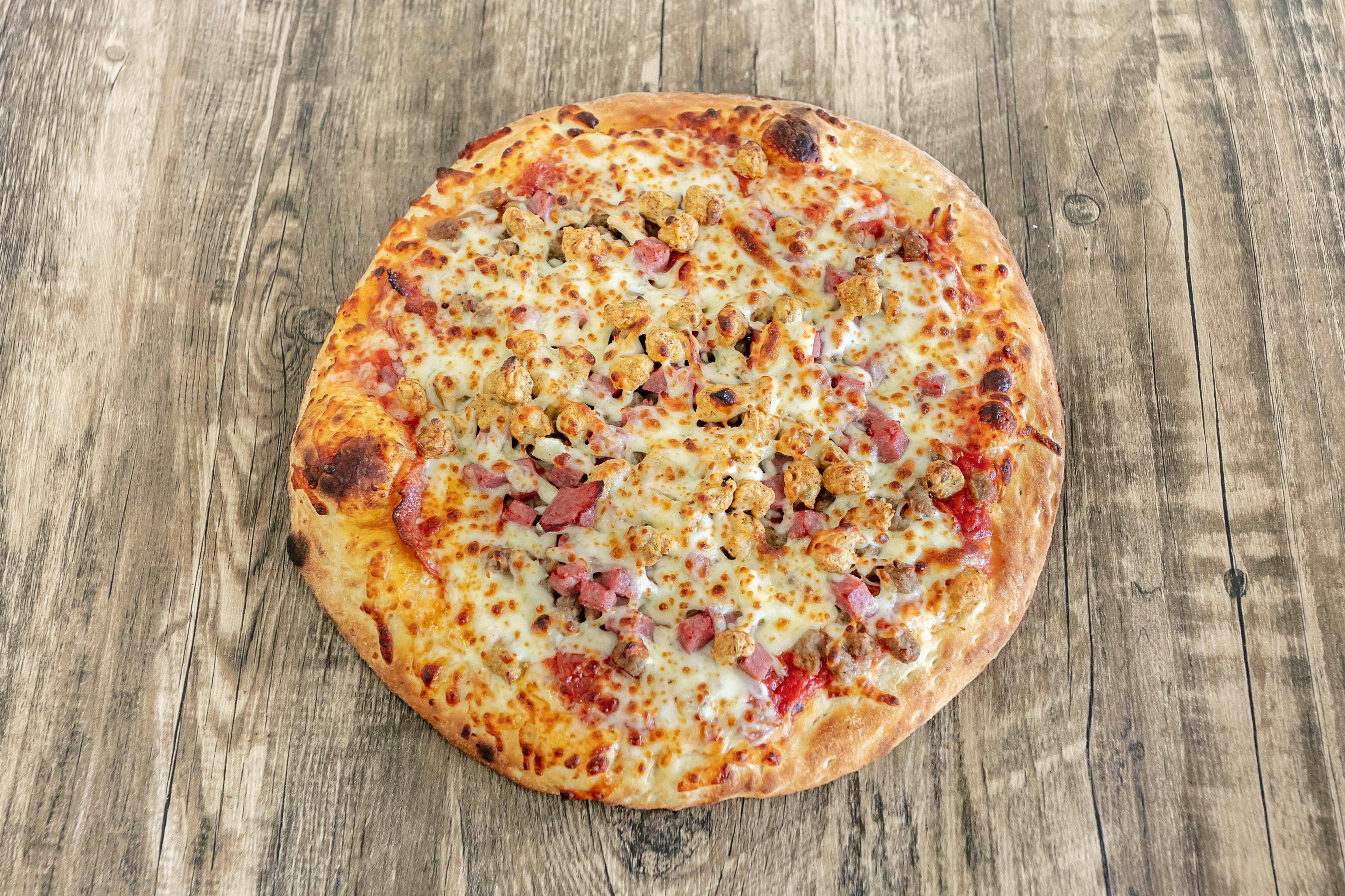 Order Meat Pizza - Small 10" food online from Best Pizza store, Atlanta on bringmethat.com