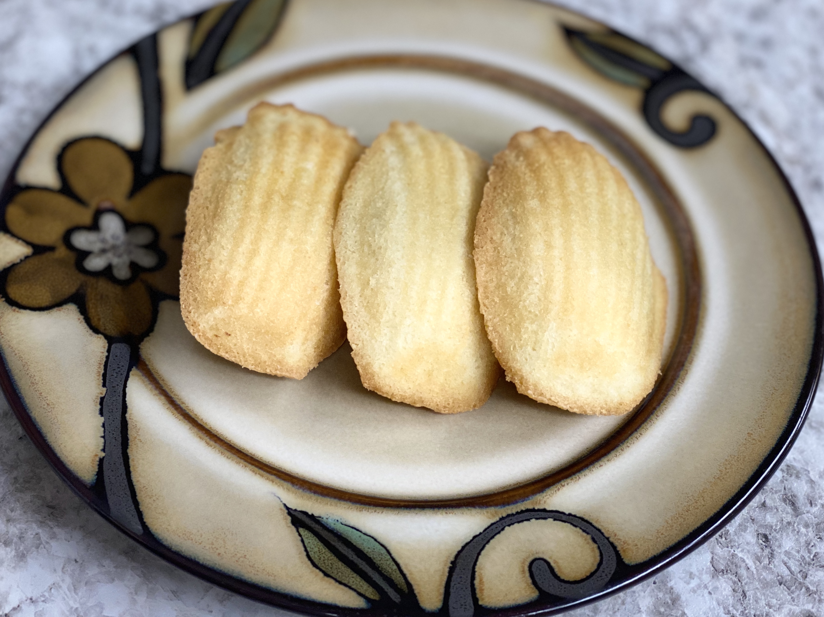 Order T12. Madeleine (3pc) 貝殼蛋糕 food online from Uncle Chen Primetime store, State College on bringmethat.com