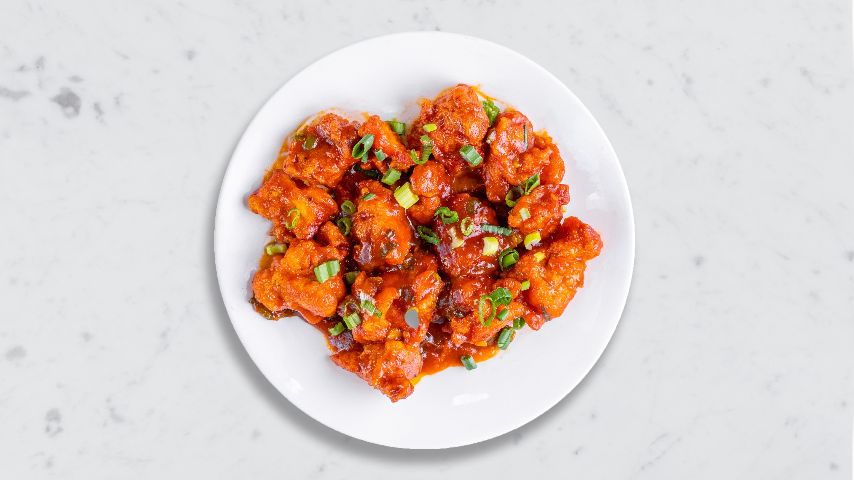 Order Cluck With Manchurian food online from Clash Of Curries store, San Francisco on bringmethat.com