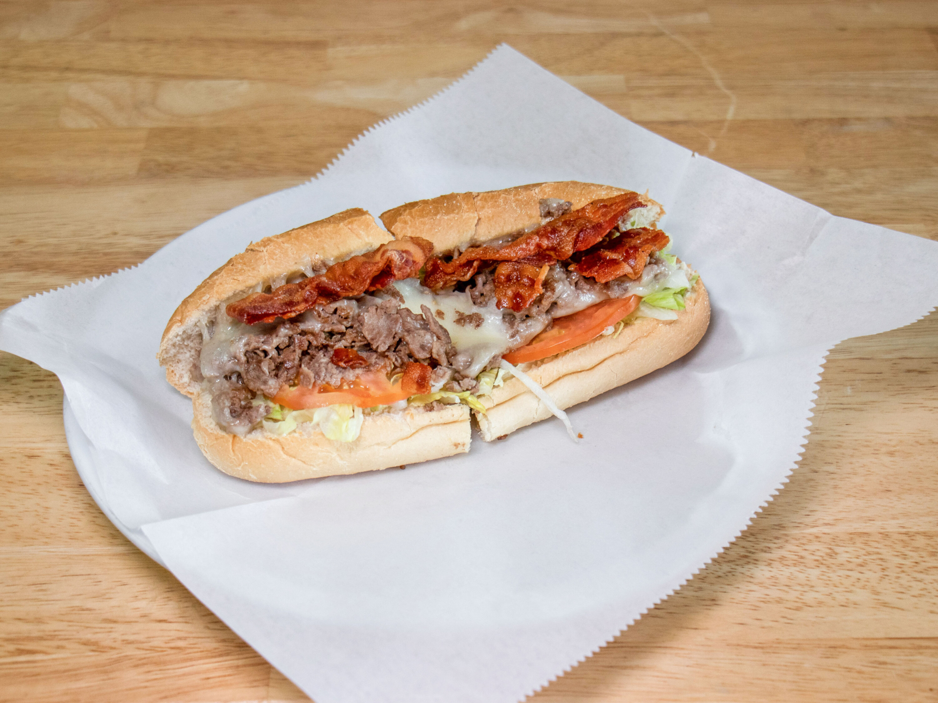 Order Bacon Steak and Cheese Sub  food online from George's Steak N Things store, Fairfax Station on bringmethat.com