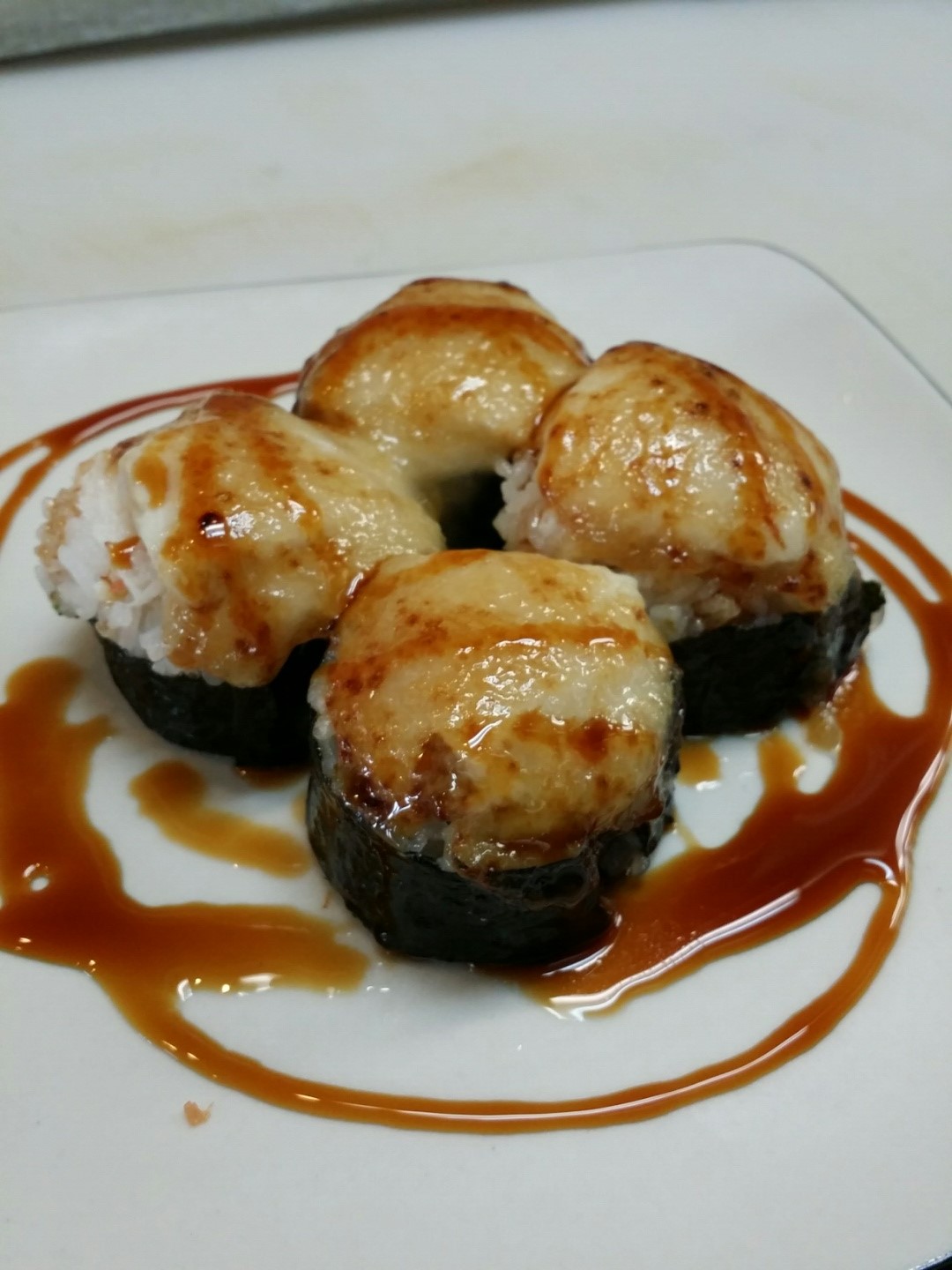 Order Baked Volcano Roll food online from Arata Sushi & Bowl store, Las Vegas on bringmethat.com