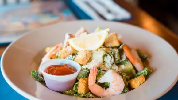 Order Shrimp Caesar Salad  food online from The Clam Bar store, Syracuse on bringmethat.com