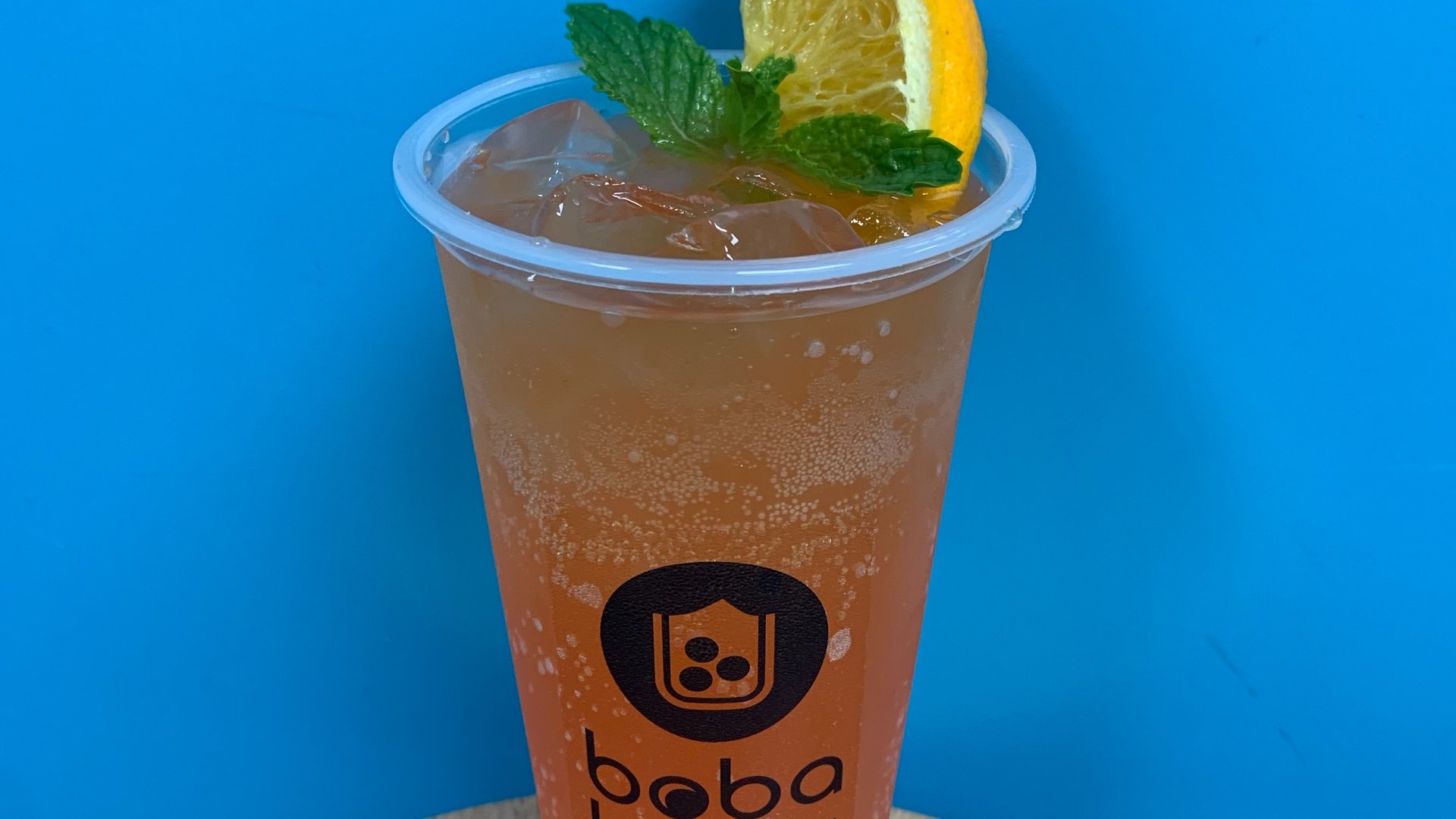 Order Tropical Sunset food online from Boba Haus store, Las Vegas on bringmethat.com