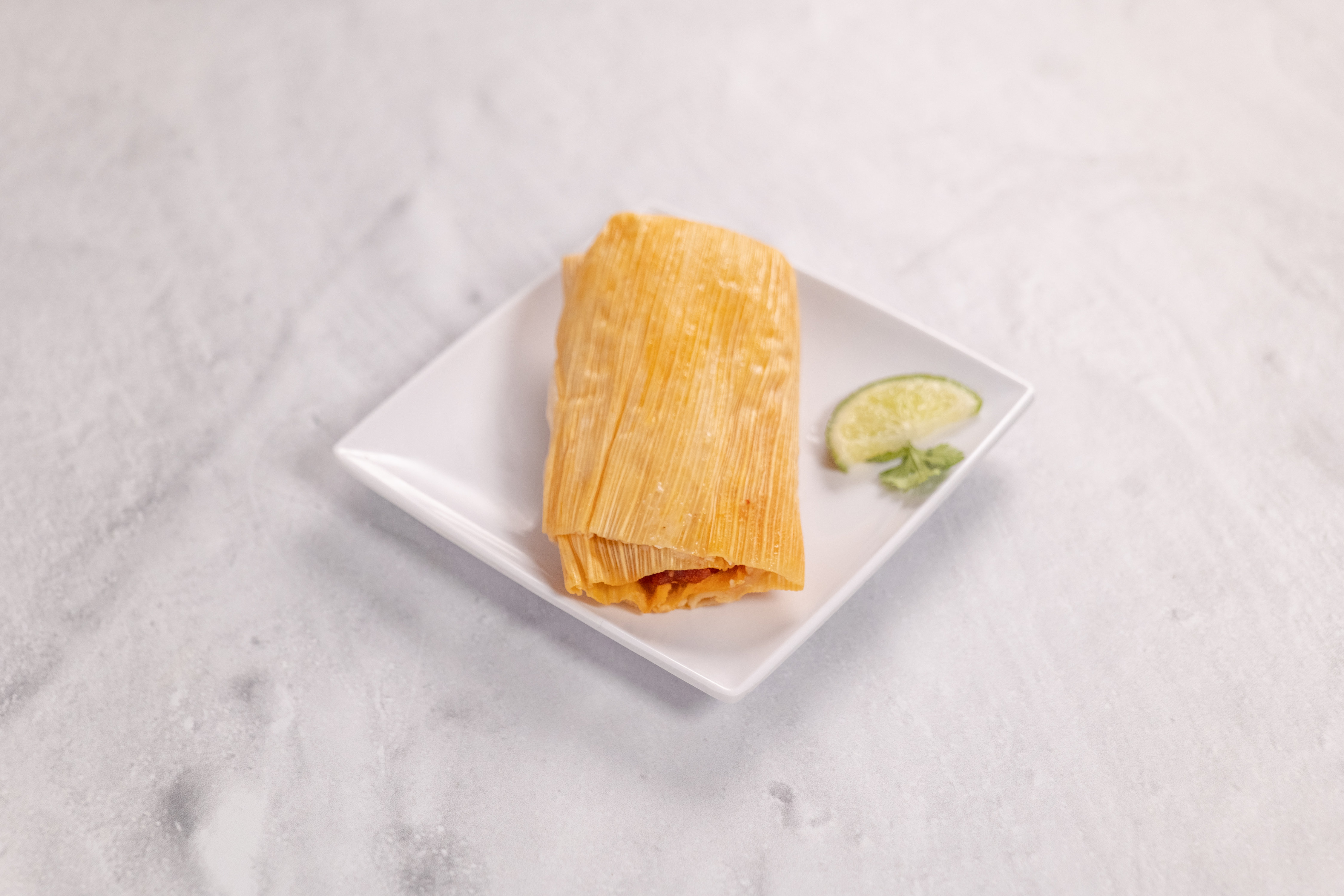 Order Tamales a la Carte food online from Don Lencho's Authentic Mexican Food store, West Covina on bringmethat.com