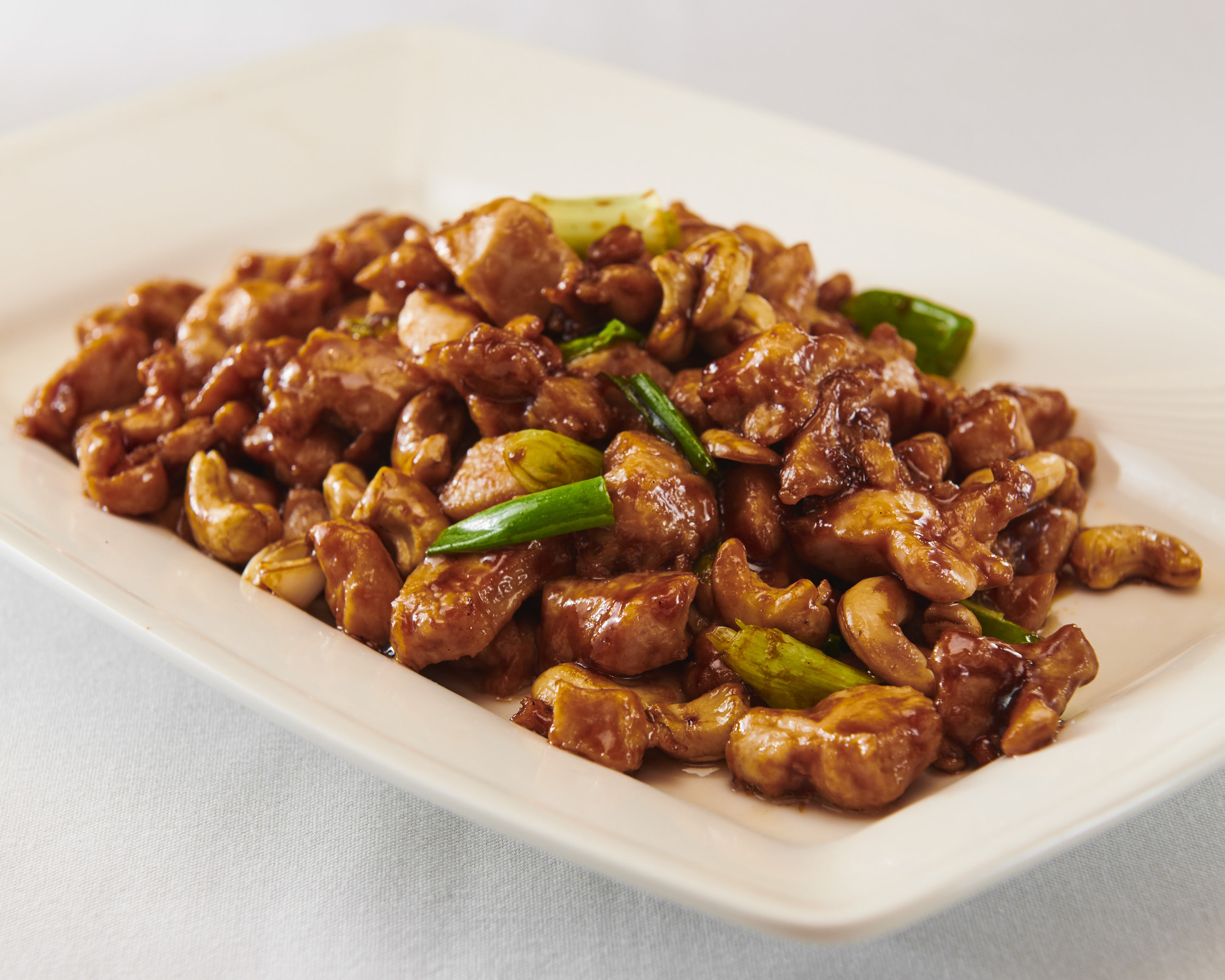 Order 56. Chicken with Cashew food online from Ollie's Sichuan store, New York on bringmethat.com
