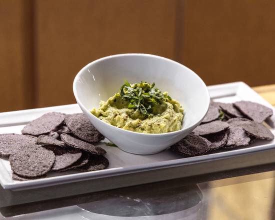 Order Roasted Garlic Chipotle Guacamole and Sprouted Blue Corn Crisps    food online from Santa Fe Oxygen & Healing Bar store, Santa Fe on bringmethat.com
