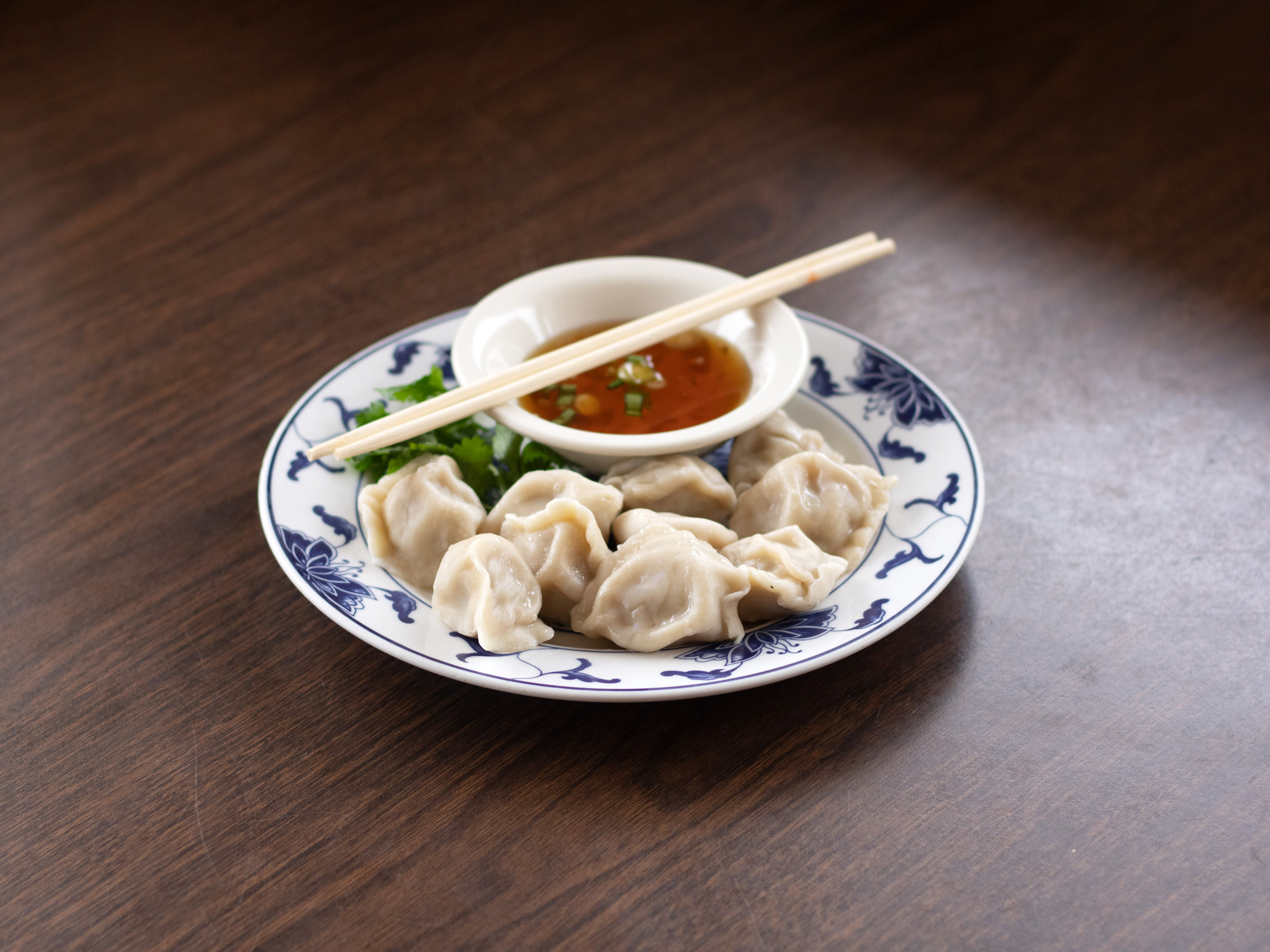 Order Steamed Pot Stickers ( 12 )  food online from Sun Sun Chinese Restaurant store, Cleveland on bringmethat.com