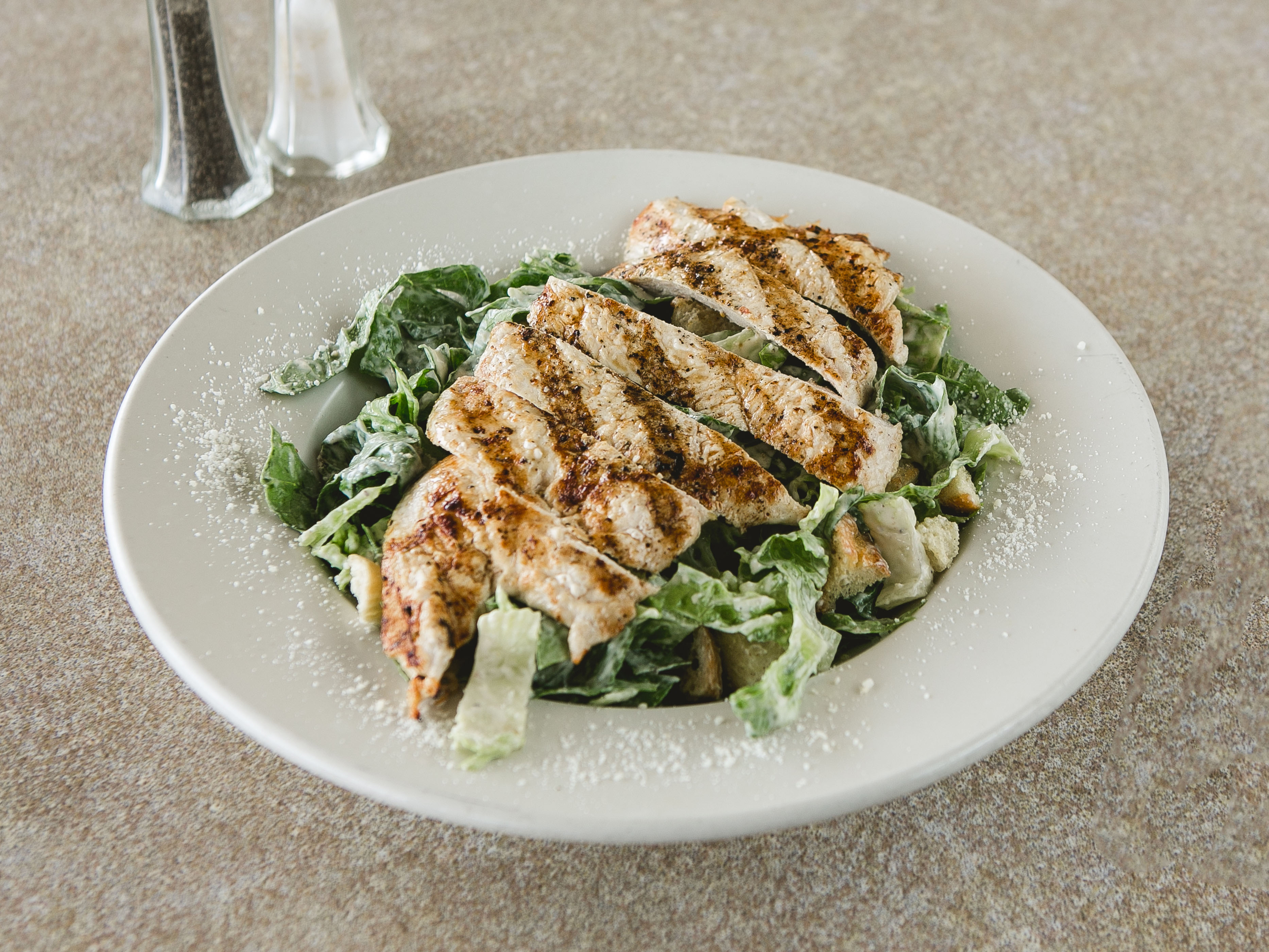 Order Grilled Chicken Caesar Salad food online from The Pizza Stop store, Collegeville on bringmethat.com