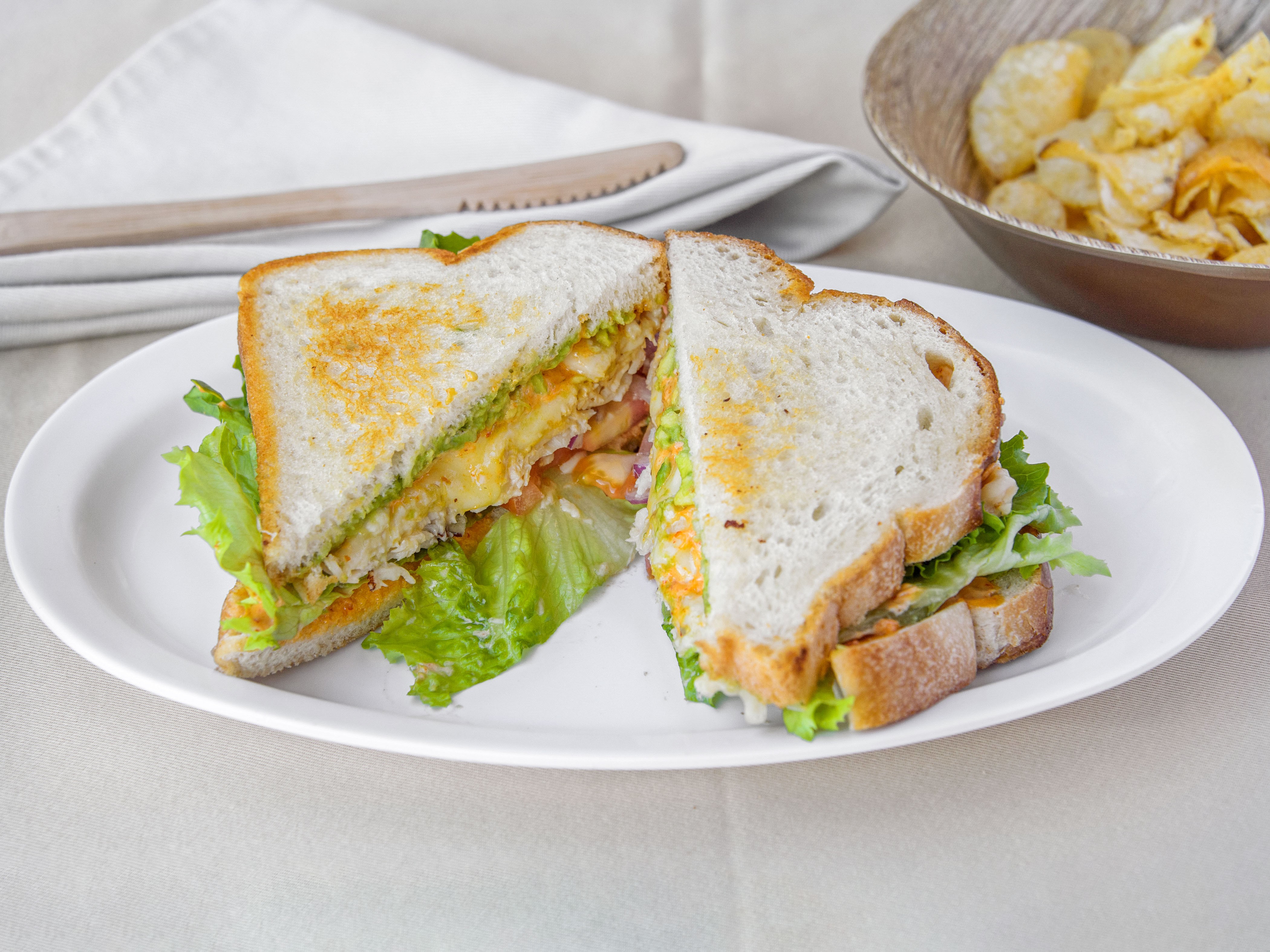 Order Cali Melt with Avocado food online from Sandwich Emporium store, San Diego on bringmethat.com